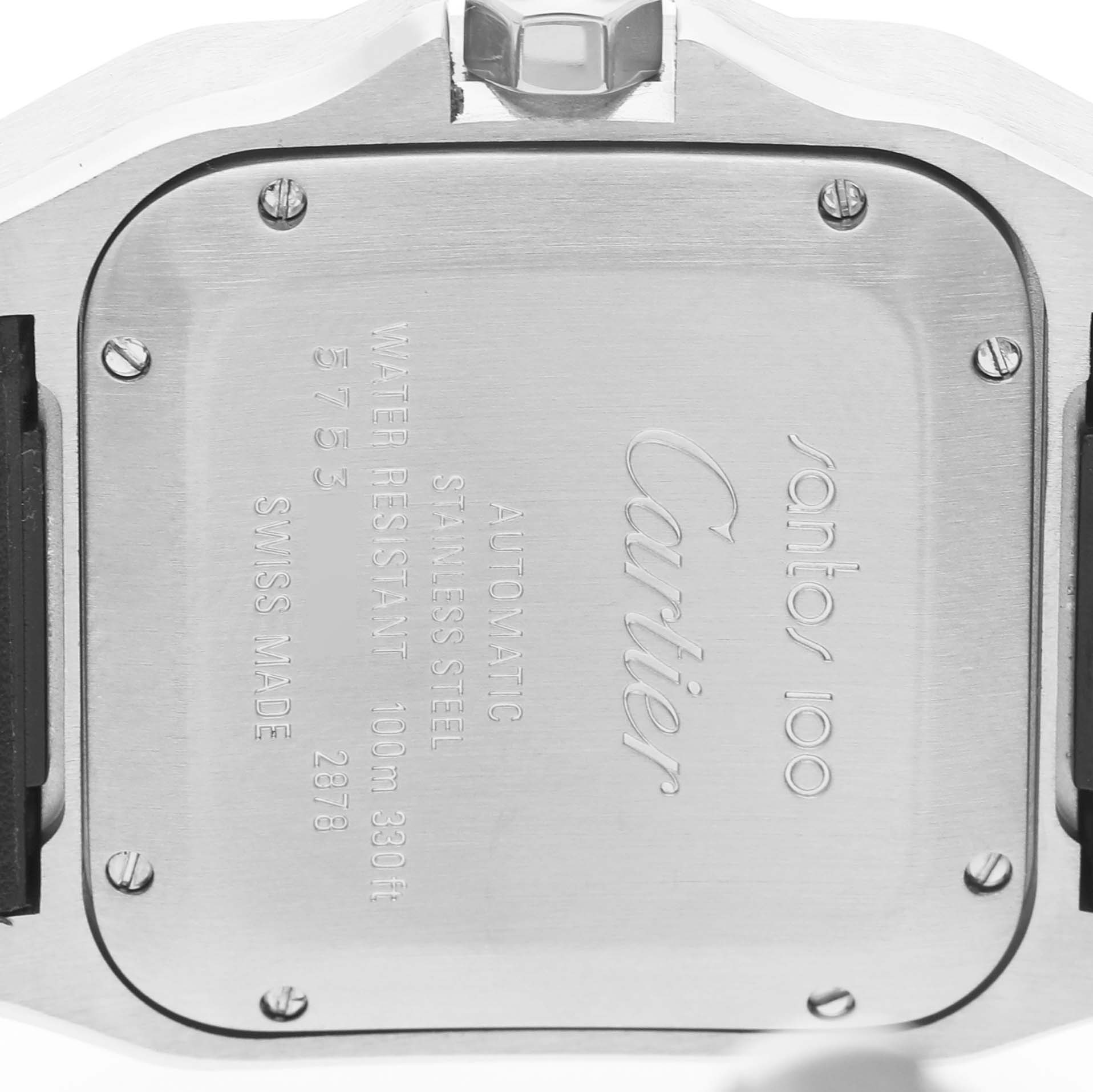 The image shows the back case of a Cartier Santos W20106X8 Men's Stainless Steel Silver Dial watch, displaying engraved details and screws.
