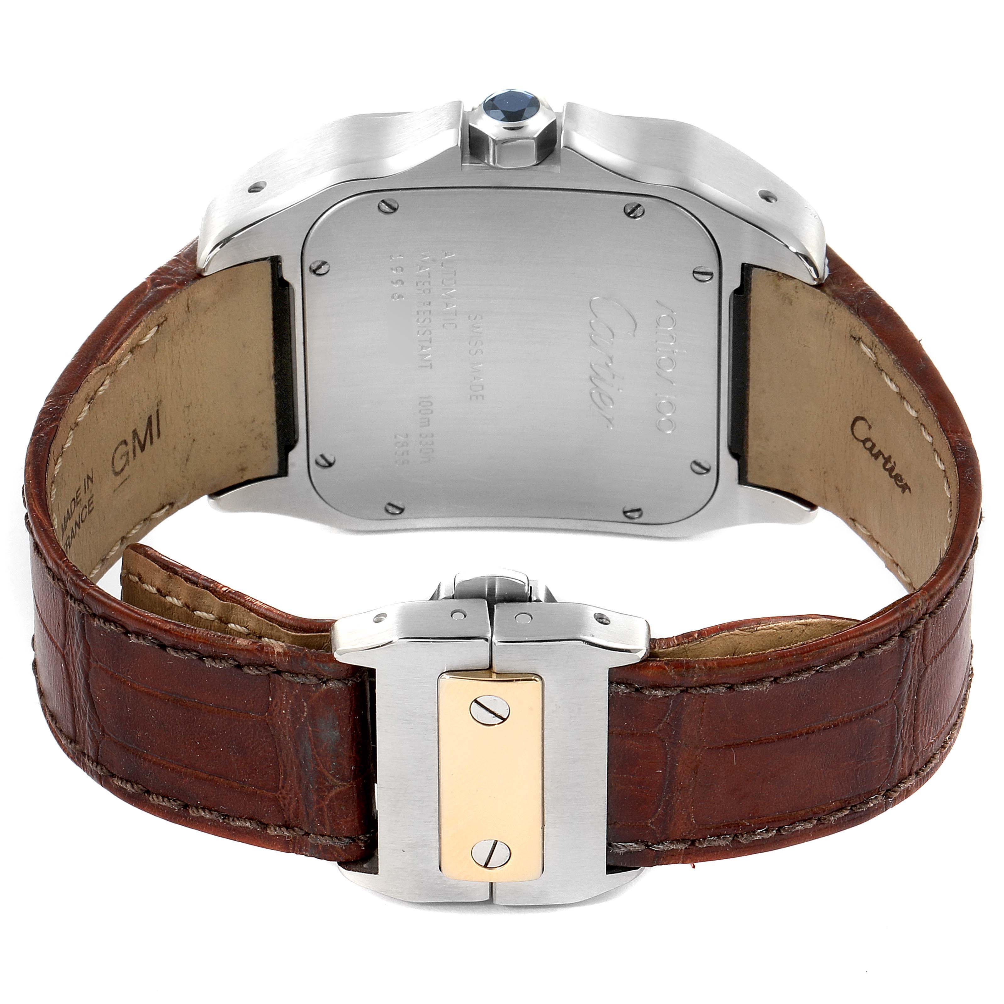 The image shows the back and clasp of a Cartier Santos W20072X7 Men's Steel and Gold (two tone) Silver Dial W20072X7 Men's Steel and Gold (two tone) Silver Dial watch with a brown leather strap.