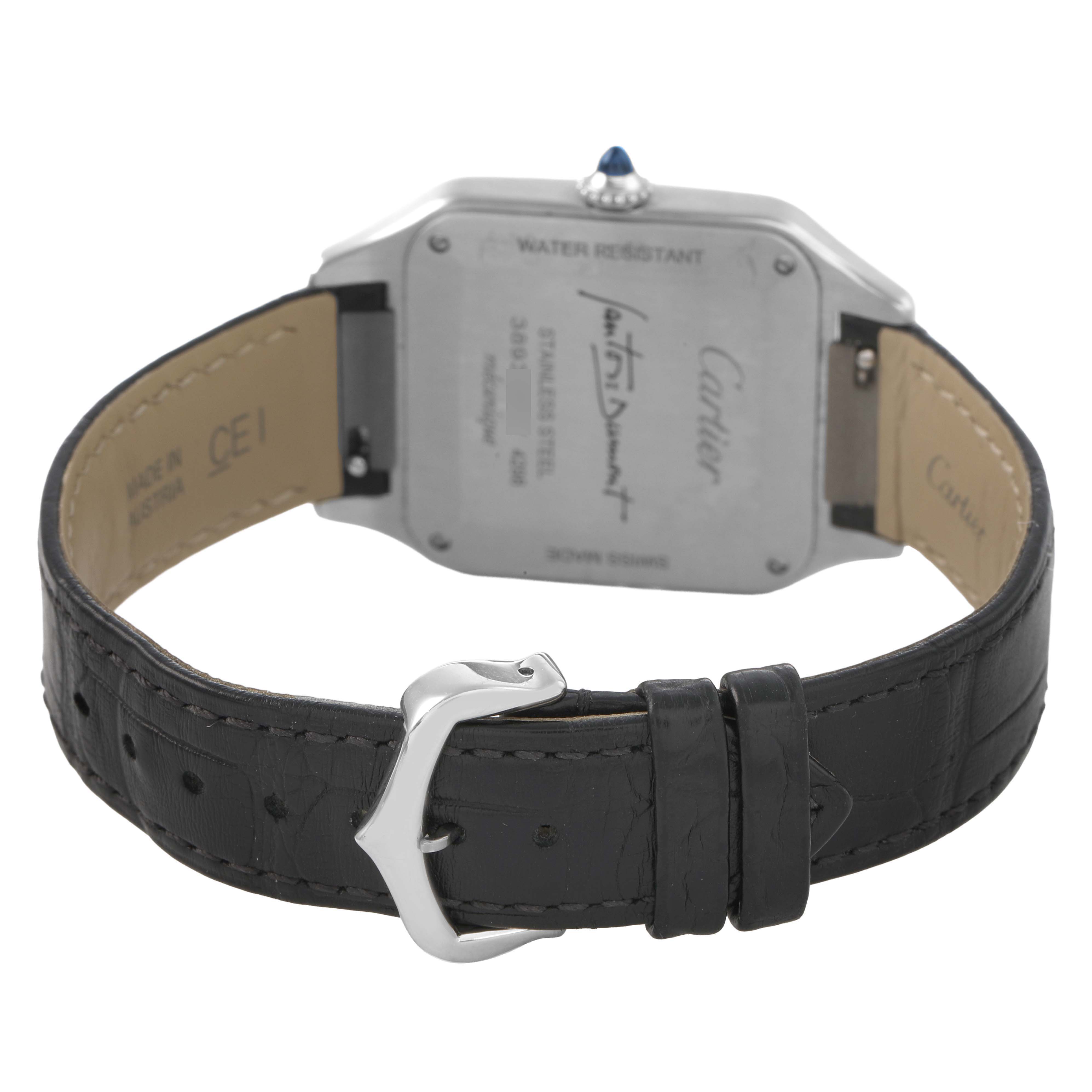 The image shows the back of a Cartier Santos WSSA0046 Women's Stainless Steel Black Dial watch, focusing on the case back and leather strap with a metal buckle.