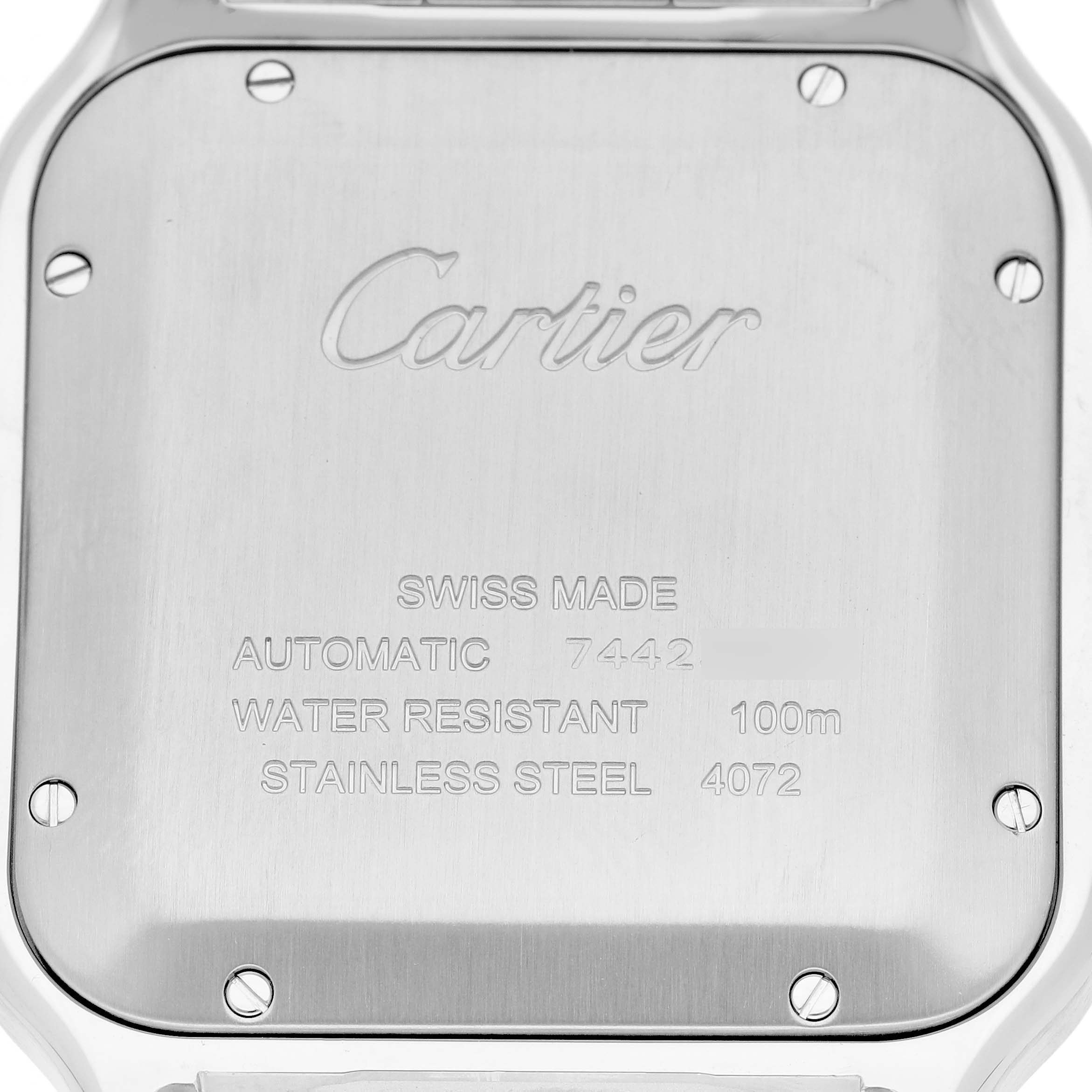 The image shows the back of a Santos model watch by Cartier, highlighting its engraved specifications.