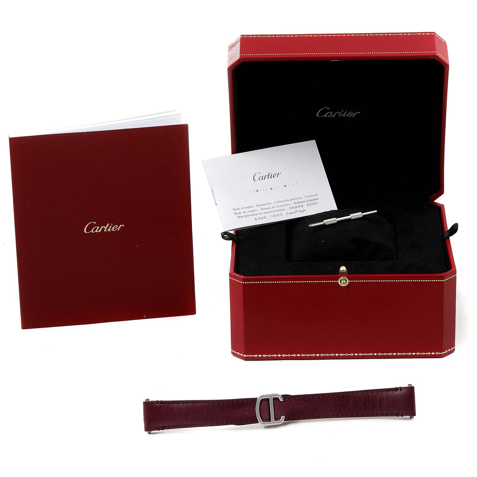 The image shows the packaging and accessories for a Cartier Santos WSSA0029 Men's Stainless Steel Silver Dial WSSA0029 Men's Stainless Steel Silver Dial watch, including a red box, booklet, documents, and extra straps.