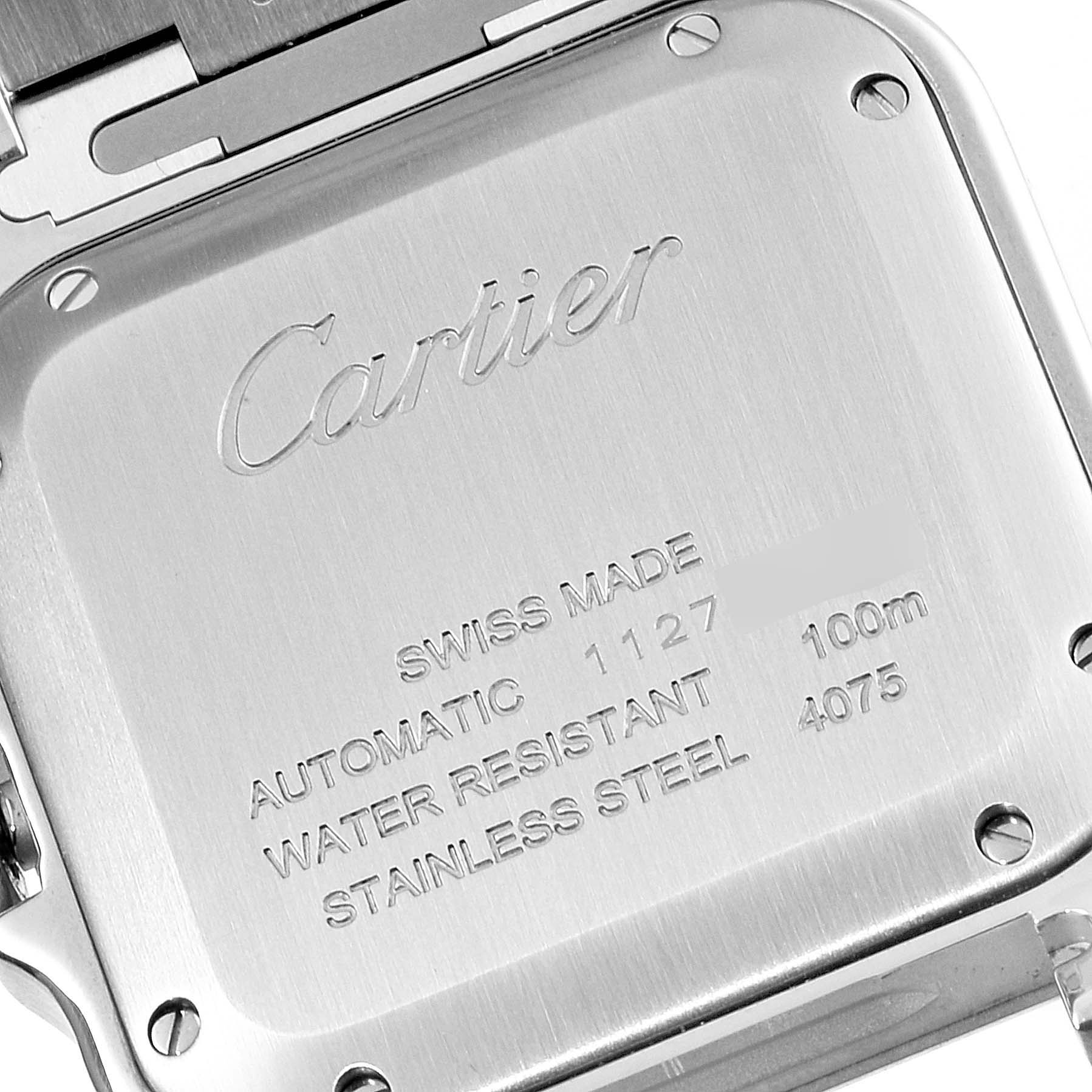 The image shows the back case of a Cartier Santos WSSA0029 Men's Stainless Steel Silver Dial WSSA0029 Men's Stainless Steel Silver Dial watch, displaying the brand name, model details, and specifications.
