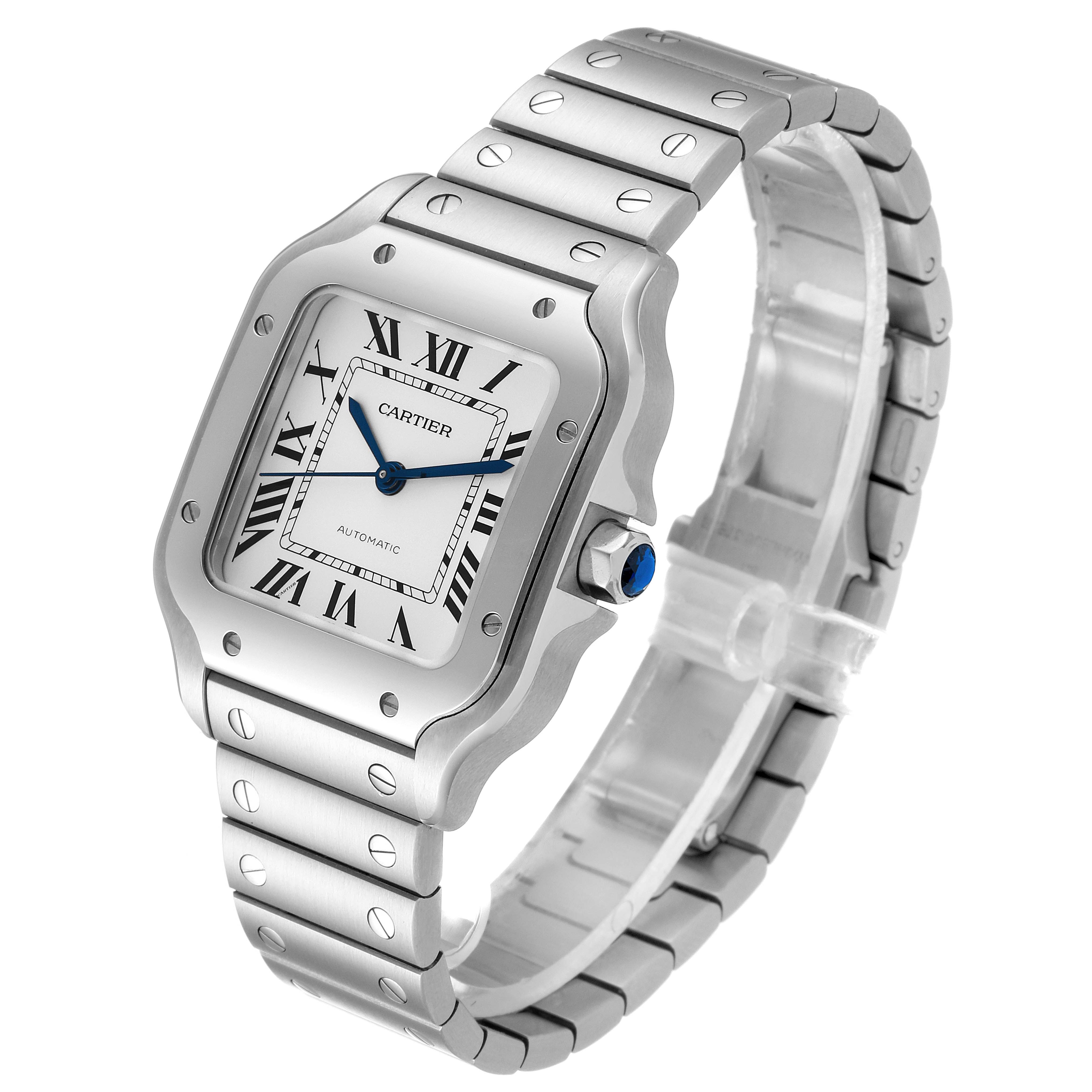 The image shows a Santos watch by Cartier at a three-quarter angle, highlighting the face, bezel, and metal bracelet.