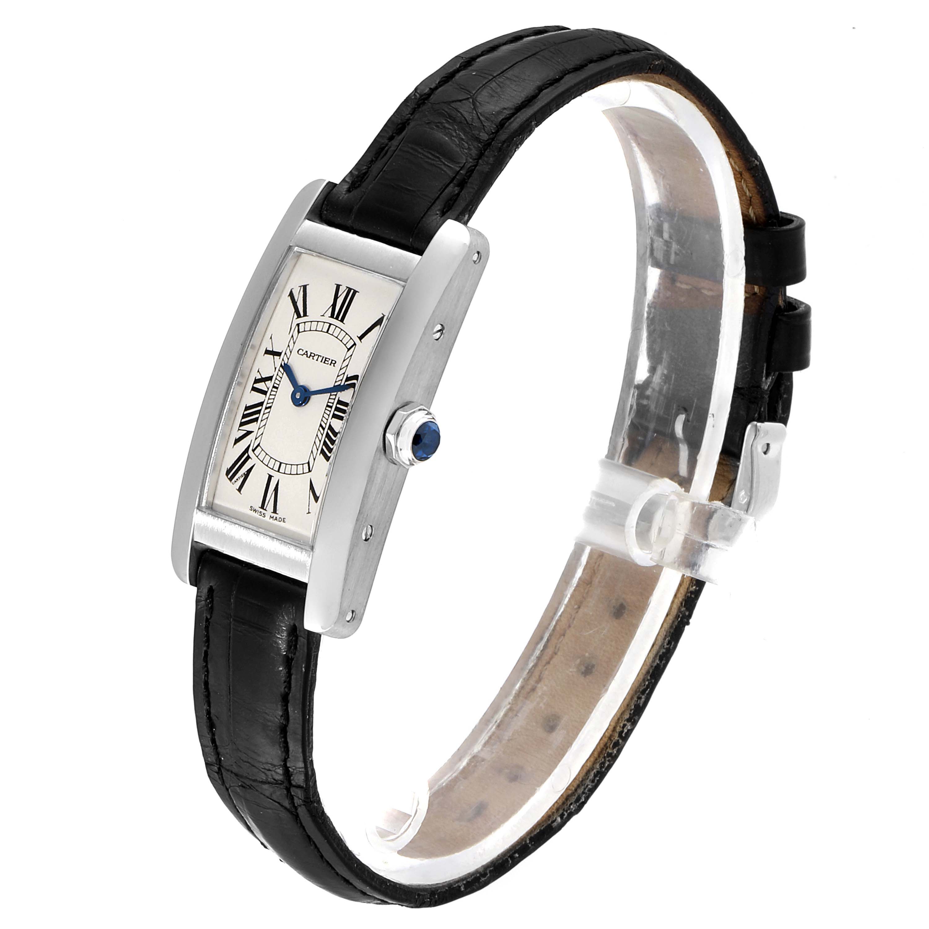 The image shows a Cartier Tank Americaine W2601956 Women's White Gold Silver Dial W2601956 Women's White Gold Silver Dial watch at a slight oblique angle, highlighting its face, strap, and side view.