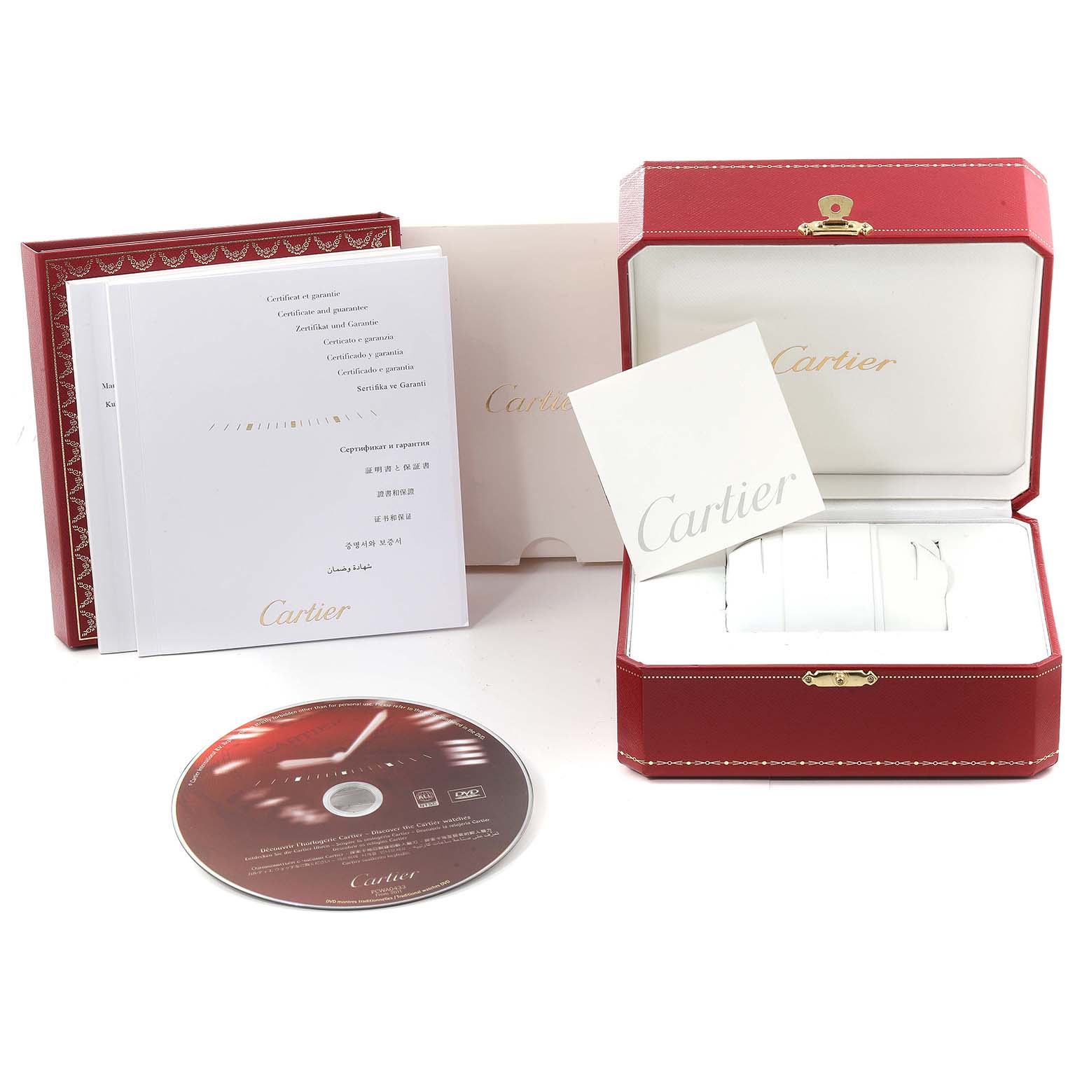 The image shows the packaging and accessories for the Cartier Tank Anglaise W5310036 Women's Steel and Gold (two tone) Silver Dial W5310036 Women's Steel and Gold (two tone) Silver Dial watch, including a red box, manuals, and a DVD.