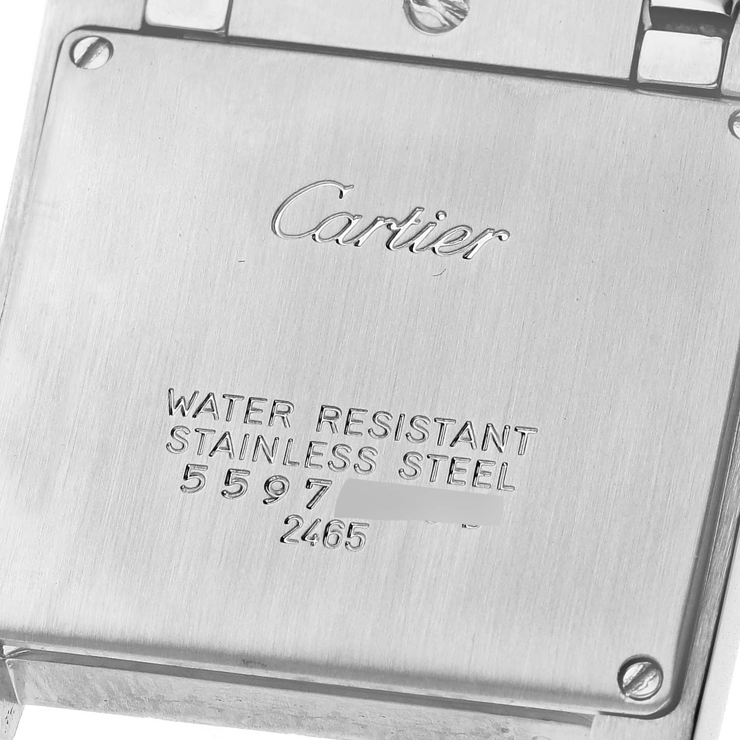 The image shows the back case of the Cartier Tank Française watch, highlighting its stainless steel build and water resistance.