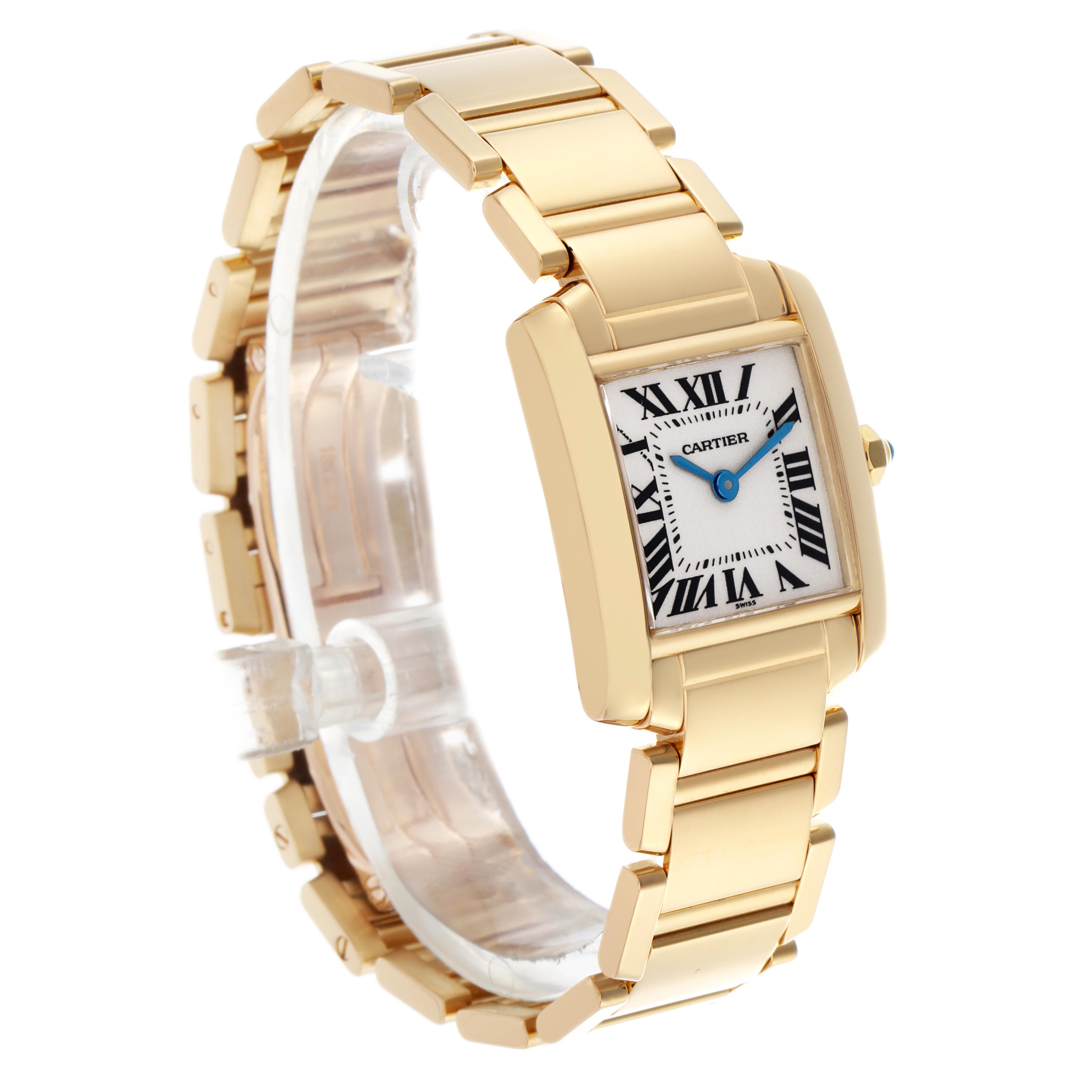 The Cartier Tank Francaise W50002N2 Women
s Yellow Gold Silver Dial W50002N2 Women
s Yellow Gold Silver Dial watch is shown in a three-quarter angle, highlighting the gold bracelet and rectangular case with Roman numerals.