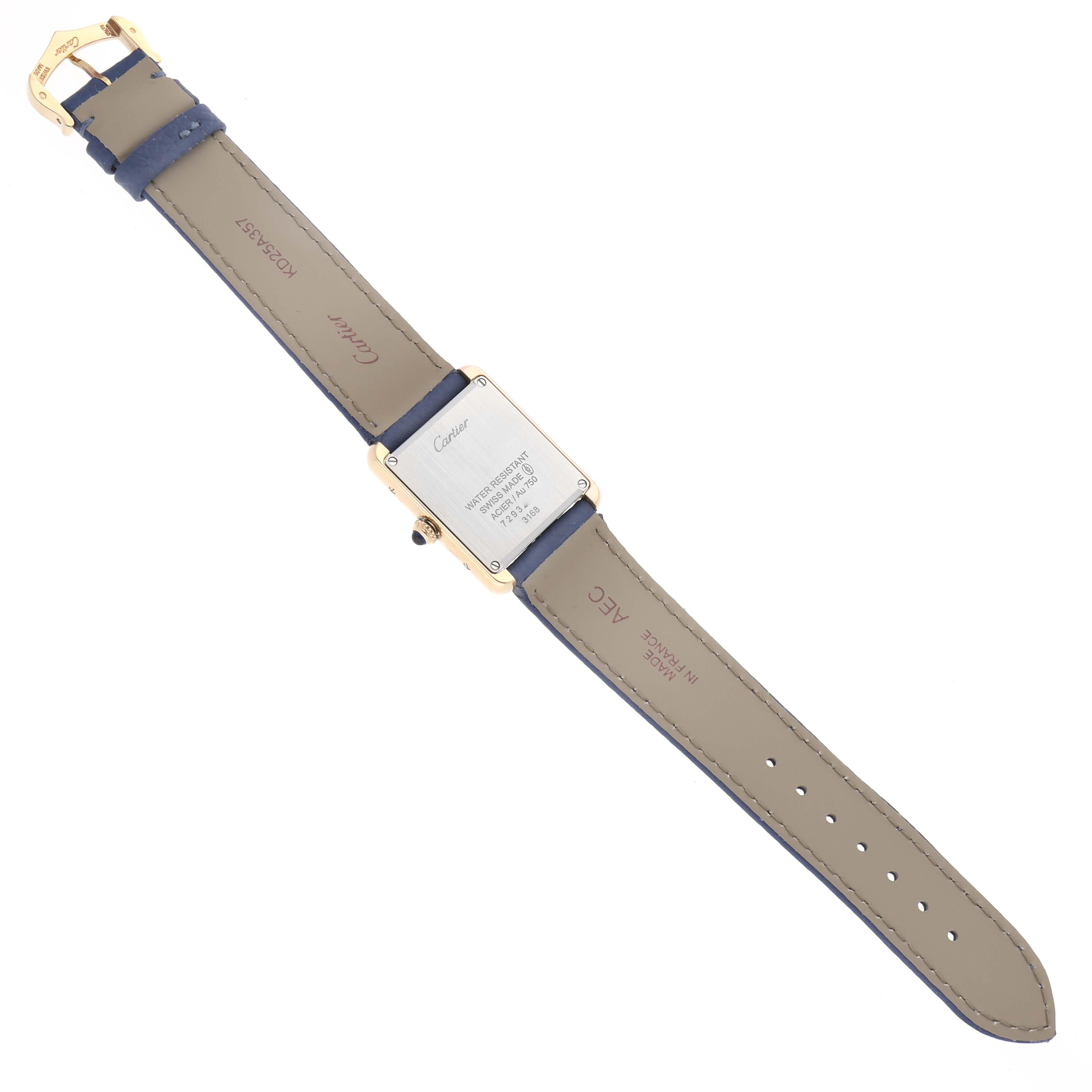 The Cartier Tank Solo W5200002 Women
s Steel and Gold (two tone) Silver Dial W5200002 Women
s Steel and Gold (two tone) Silver Dial watch is shown from the back, displaying the case back and leather strap fully extended.