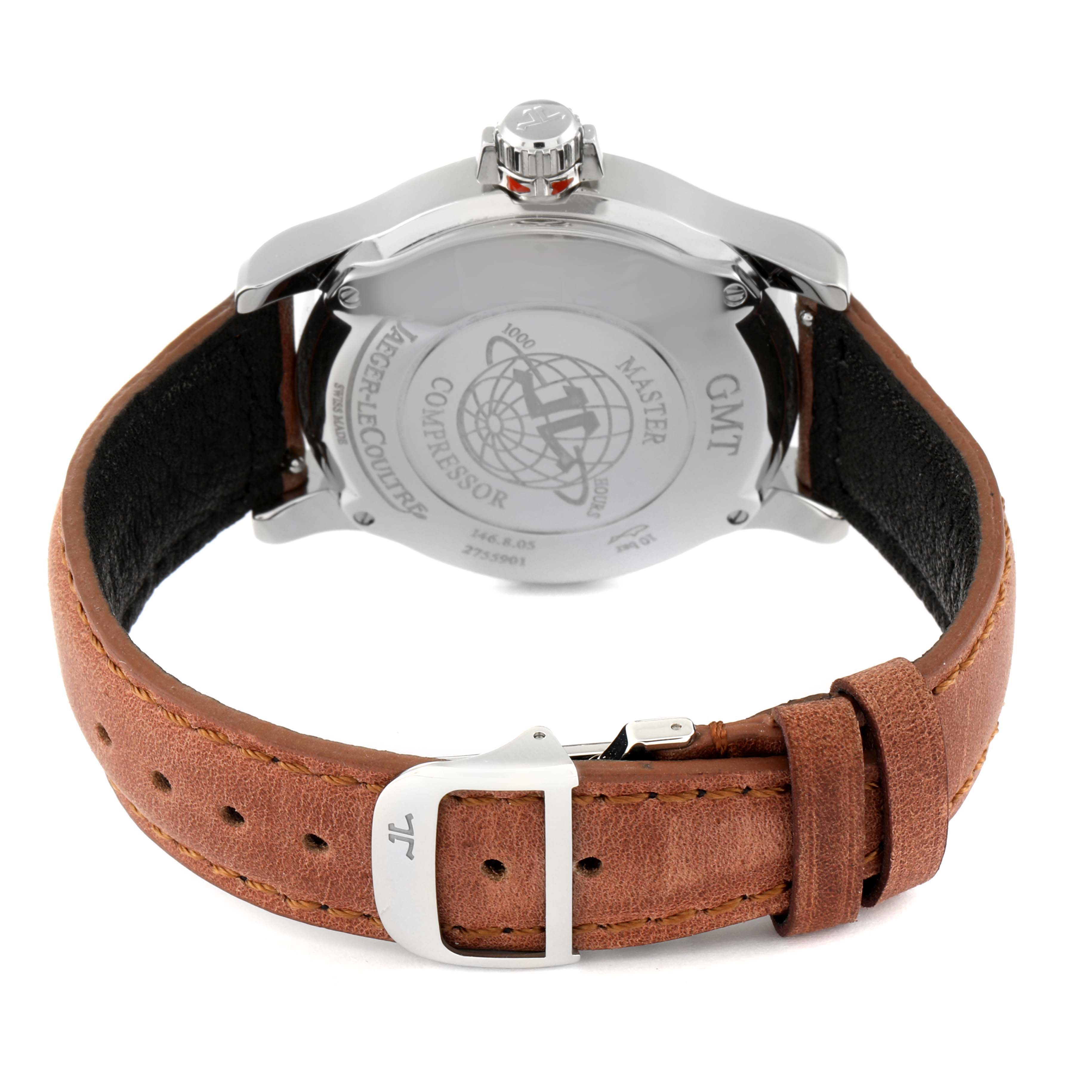 The image shows the back view of a Jaeger-LeCoultre Master model watch, highlighting its case back, crown, and brown leather strap.
