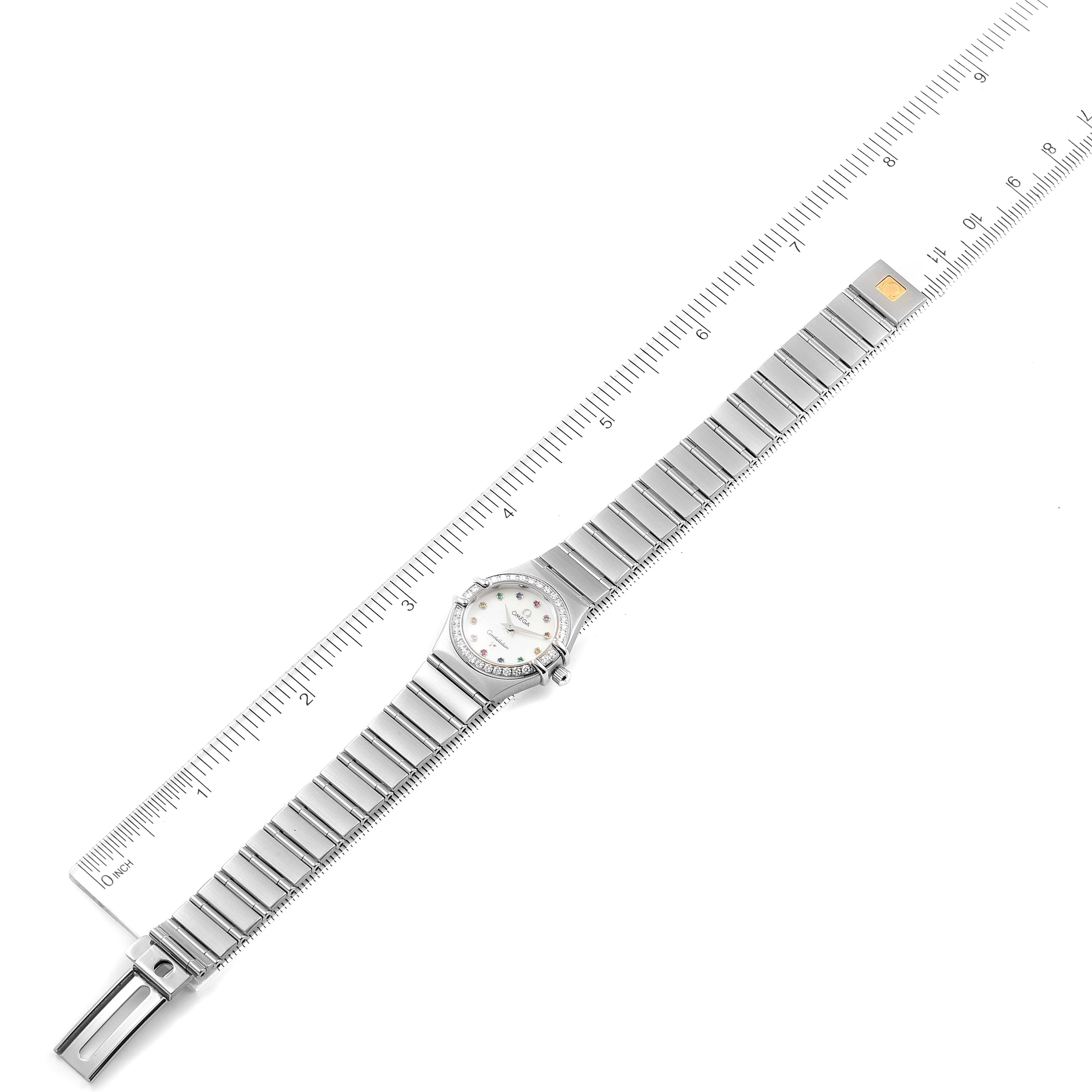 The Omega 1460.79.00 Women's Stainless Steel Mother of Pearl Dial 1460.79.00 Women's Stainless Steel Mother of Pearl Dial Constellation Iris Mother of Pearl Multi Stone Steel Ladies Watch 1460.79.00 is shown flat with a ruler for scale.