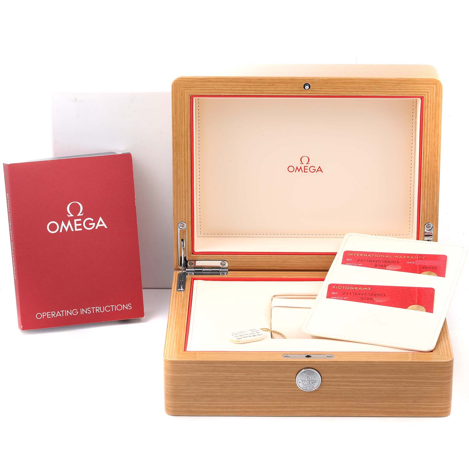 This image shows the Omega Aqua Terra 231.10.42.21.03.003 Men
s Stainless Steel Blue Dial 231.10.42.21.03.003 Men
s Stainless Steel Blue Dial watch box, operating instructions, and warranty cards from a front angle.