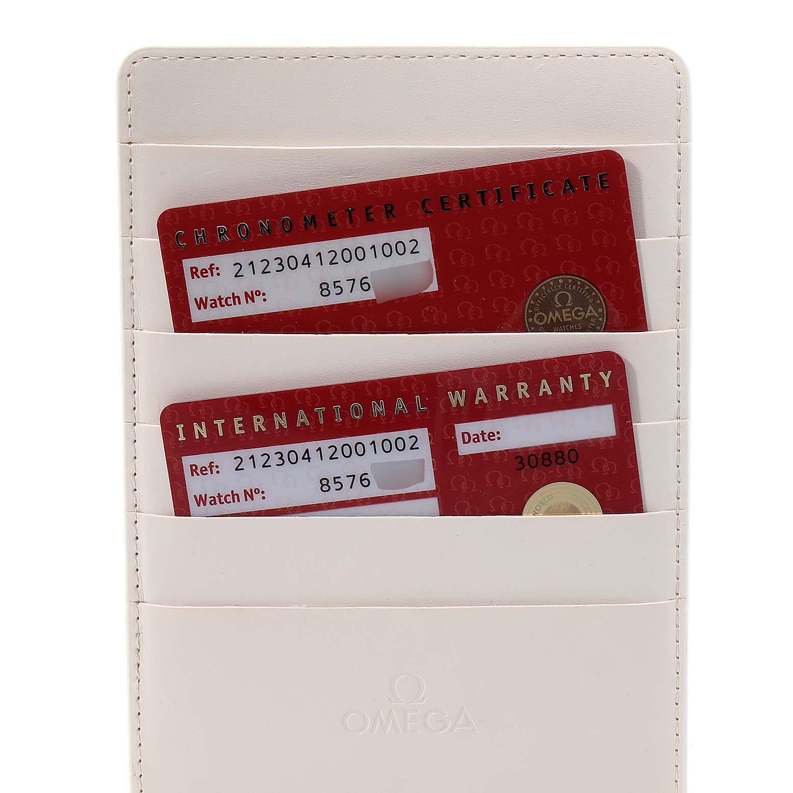 The image shows a white card holder with two red certification cards for the Omega Seamaster 212.30.41.20.01.002 Men
s Stainless Steel Black Dial 212.30.41.20.01.002 Men
s Stainless Steel Black Dial model, viewed from the front.