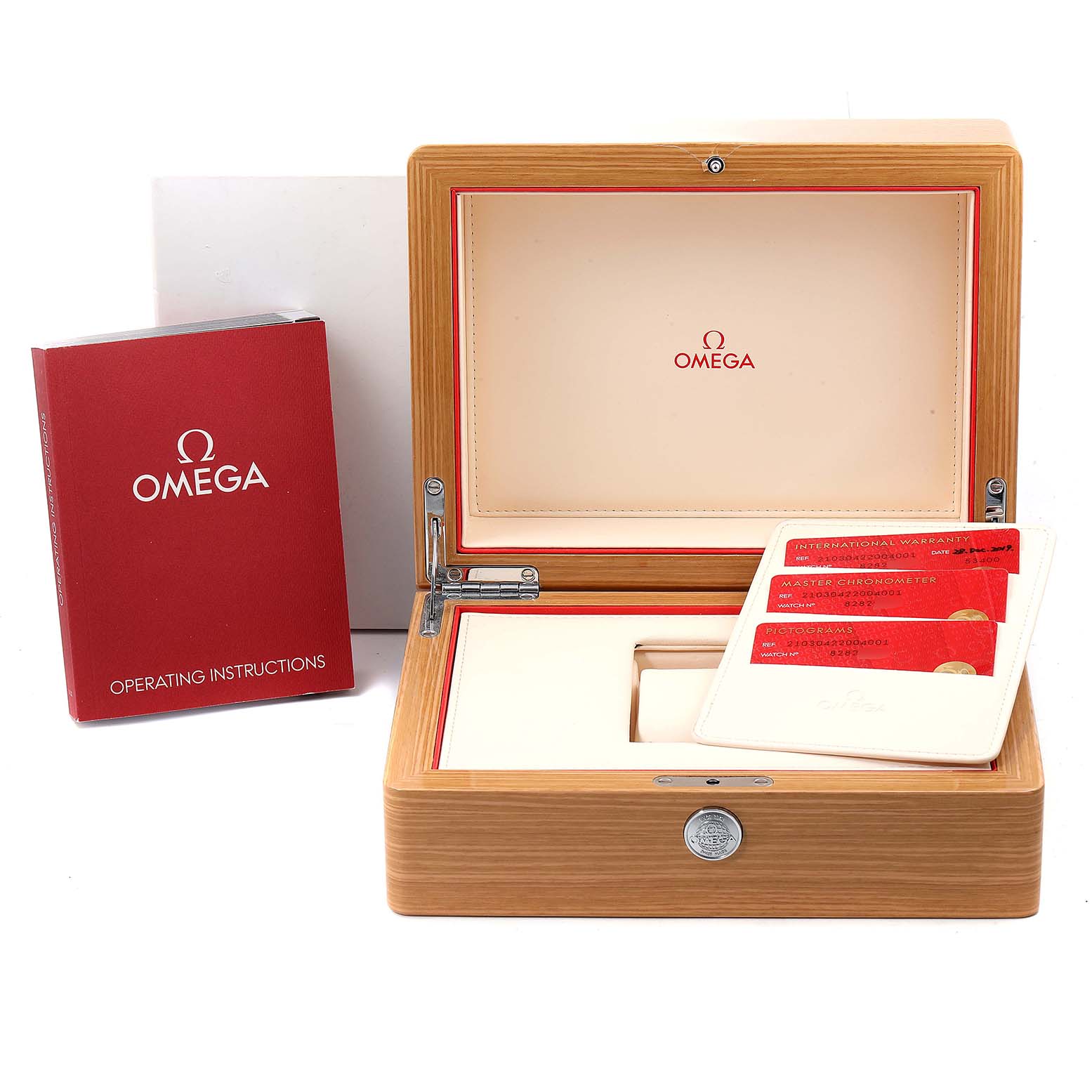 A wooden Omega Seamaster 210.30.42.20.04.001 Men
s Stainless Steel White Dial 210.30.42.20.04.001 Men
s Stainless Steel White Dial watch box at an open angle, with operating instructions and warranty cards displayed.
