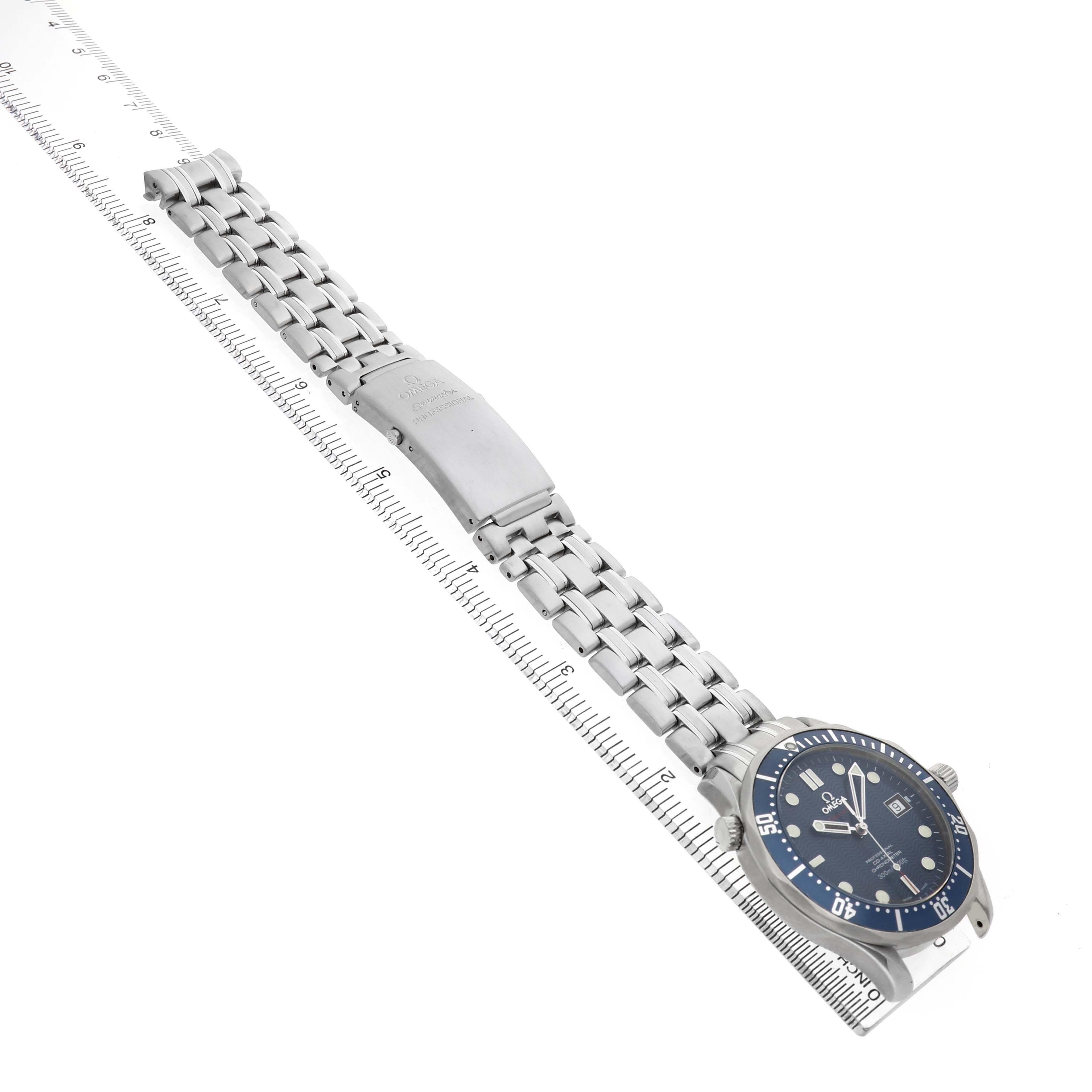 The image shows an Omega Seamaster 2220.80.00 Men's Stainless Steel Blue Dial watch at a slight angle, highlighting the dial, bezel, and metal bracelet with a clasp.