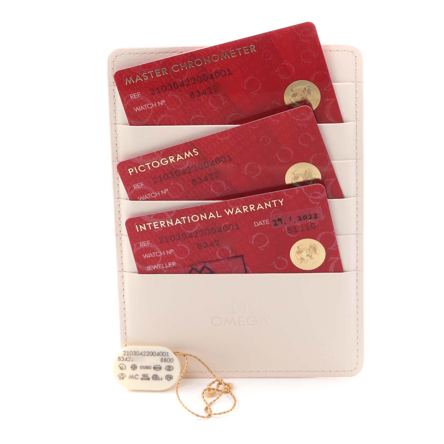 The image shows Omega Seamaster 210.30.42.20.04.001 Men
s Stainless Steel White Dial 210.30.42.20.04.001 Men
s Stainless Steel White Dial watch accessories including warranty cards and a tag, all presented at a front angle.