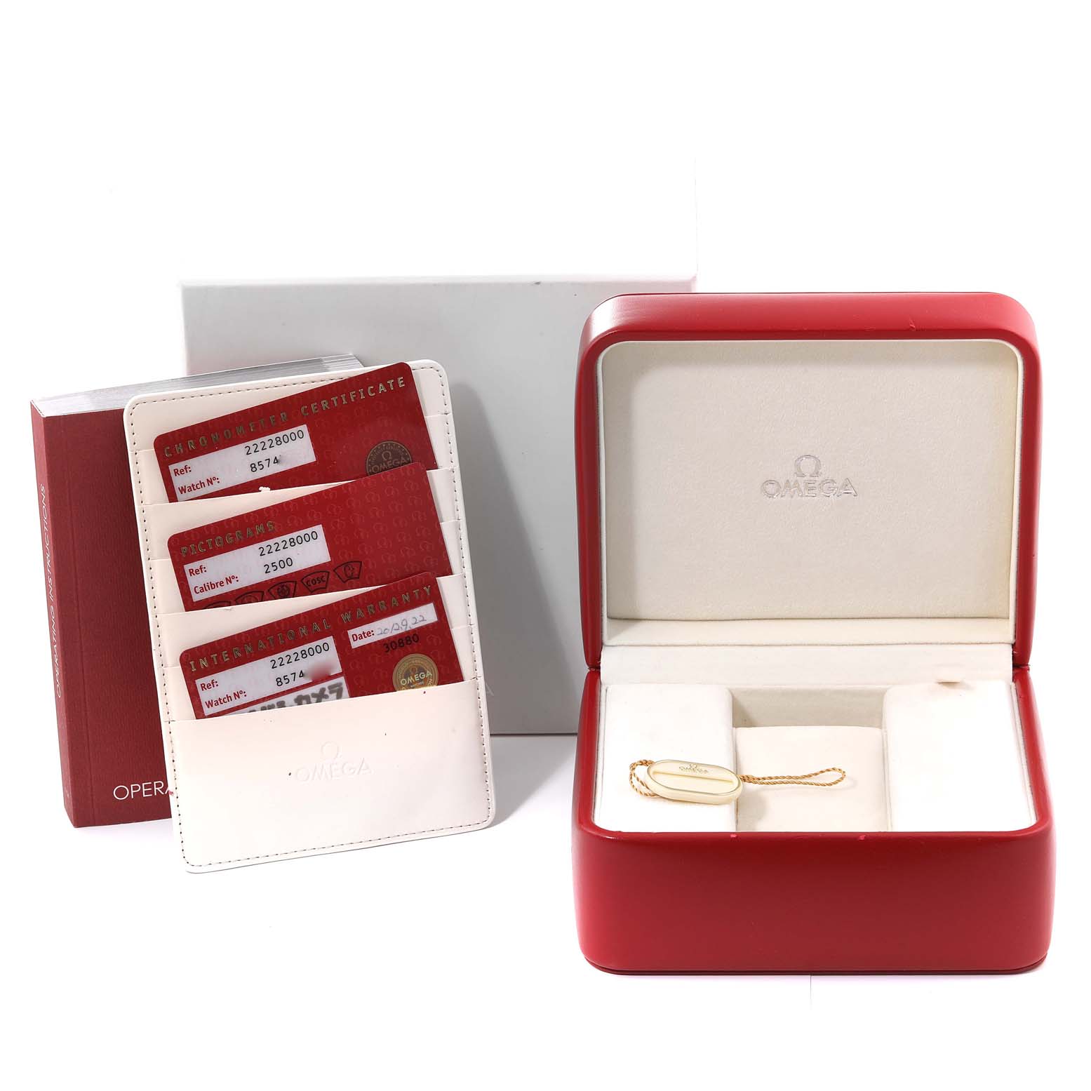 The image shows a red Omega Seamaster 2222.80.00 Men
s Stainless Steel Blue Dial 2222.80.00 Men
s Stainless Steel Blue Dial watch box, warranty cards in a holder, and a hang tag, all with a frontal view.