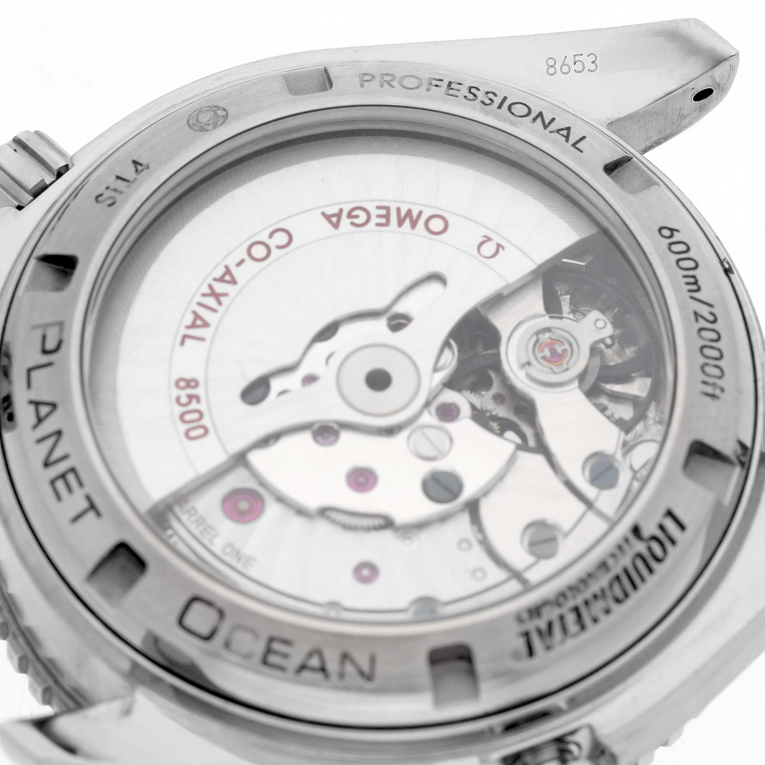 The image shows the case back of an Omega Seamaster 232.90.42.21.03.001 Men's Titanium Blue Dial watch, displaying its movement and "Planet Ocean" branding.