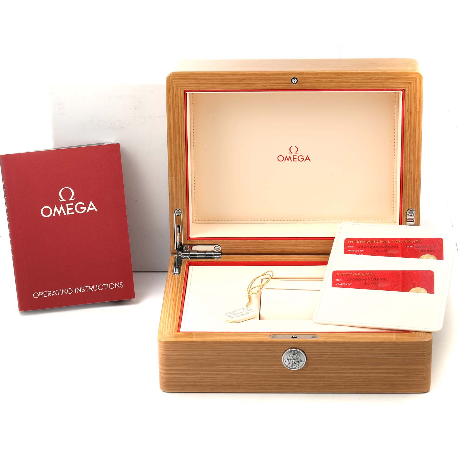 The image shows the Omega Seamaster 232.90.46.21.03.001 Men's Titanium Blue Dial 232.90.46.21.03.001 Men's Titanium Blue Dial watch's packaging box, operating instructions booklet, and warranty cards.