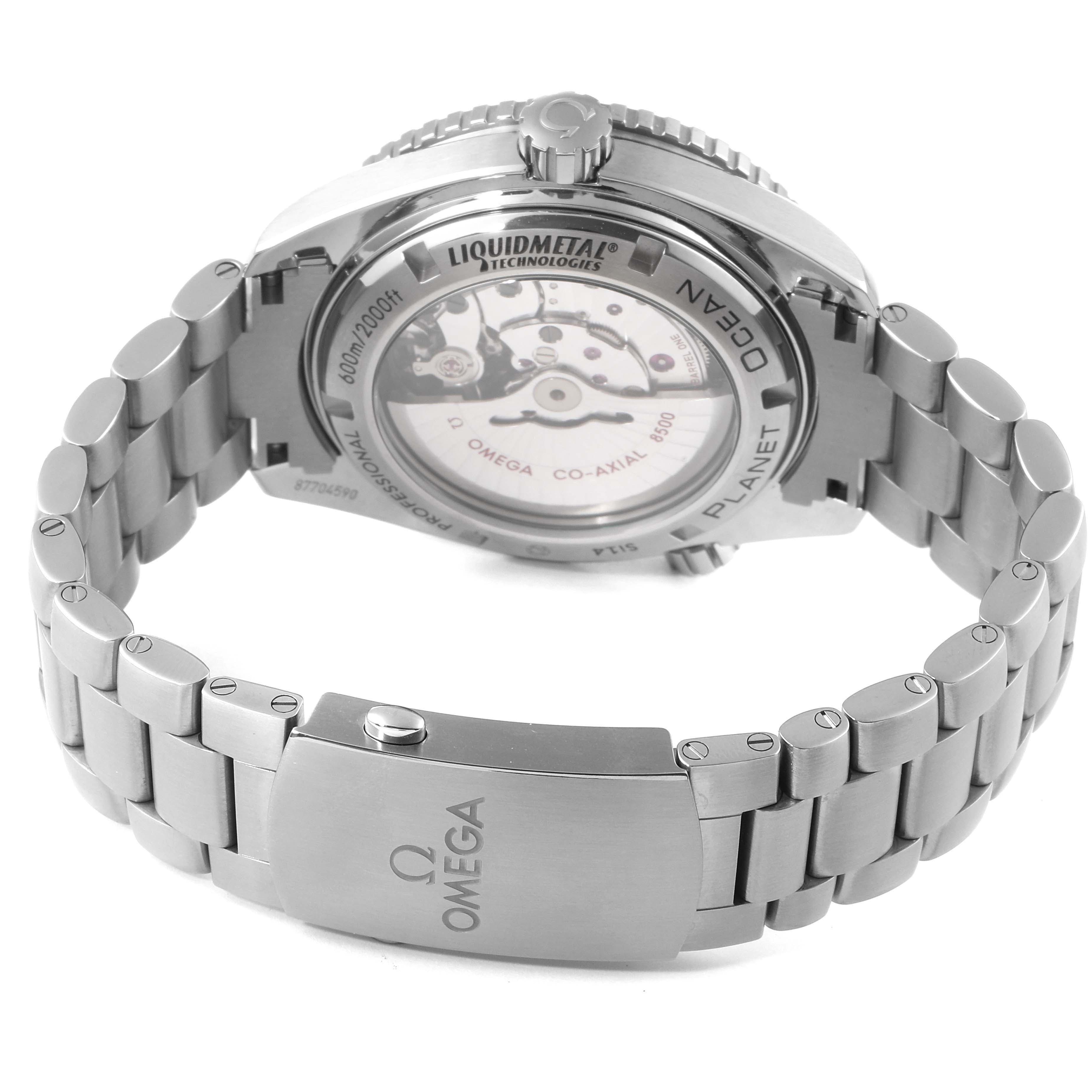 The image shows the case back and bracelet clasp of the Omega Seamaster 232.90.46.21.03.001 Men's Titanium Blue Dial 232.90.46.21.03.001 Men's Titanium Blue Dial watch, highlighting the movement and Liquidmetal technology.