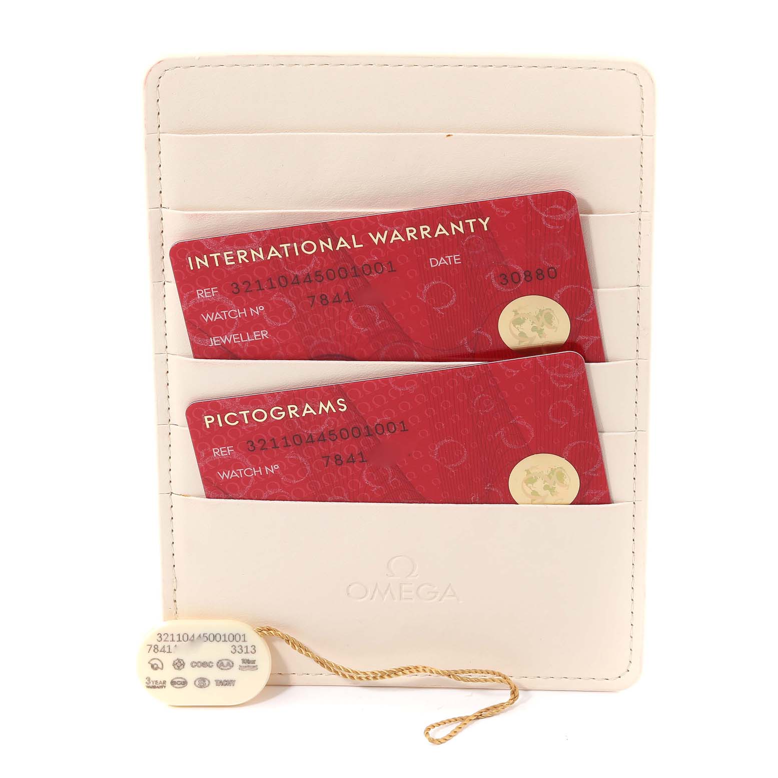 The image shows the warranty cards and pictograms for an Omega Speedmaster 321.10.44.50.01.001 Men
s Stainless Steel Black Dial 321.10.44.50.01.001 Men
s Stainless Steel Black Dial, along with the associated tag.