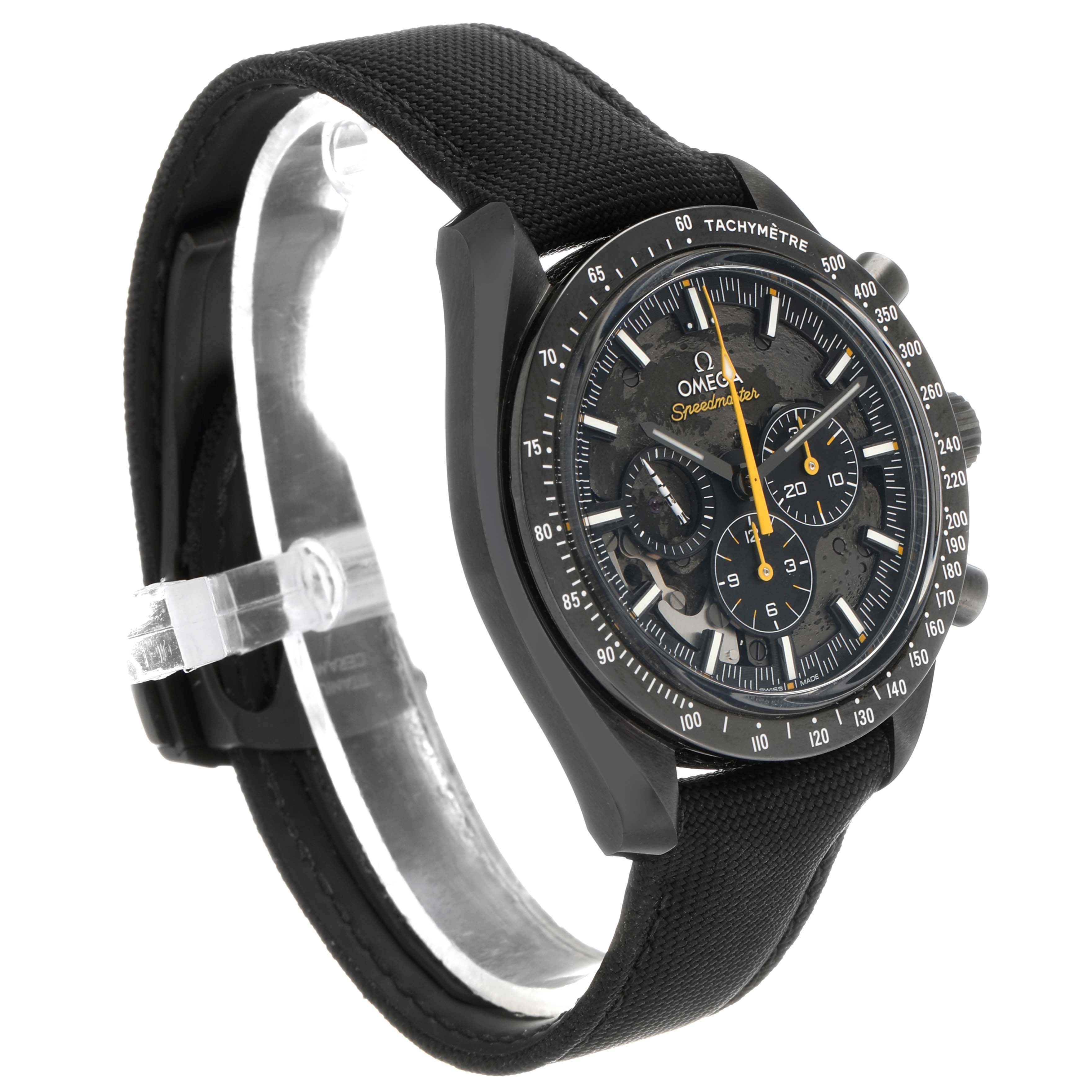 The Omega Speedmaster 310.92.44.50.01.001 Men's Ceramic Black Dial watch is shown at a three-quarter angle highlighting the face, bezel, and fabric strap.