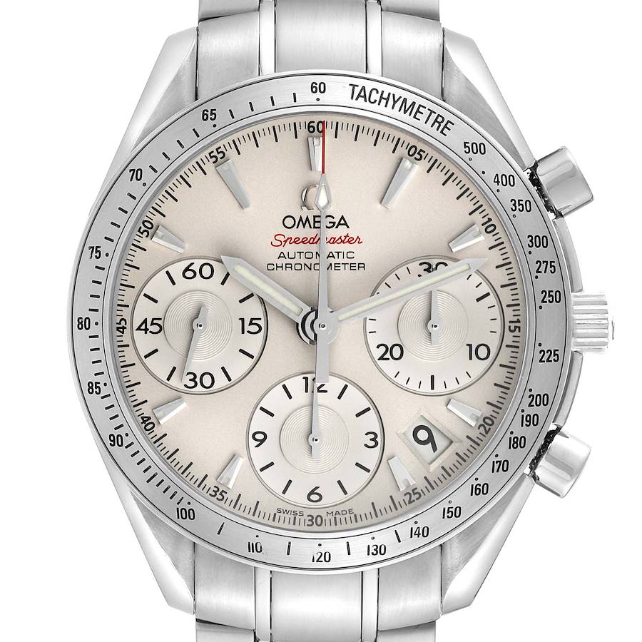 The Omega Speedmaster watch is shown from a front angle, displaying its dial, subdials, tachymeter bezel, and crown.
