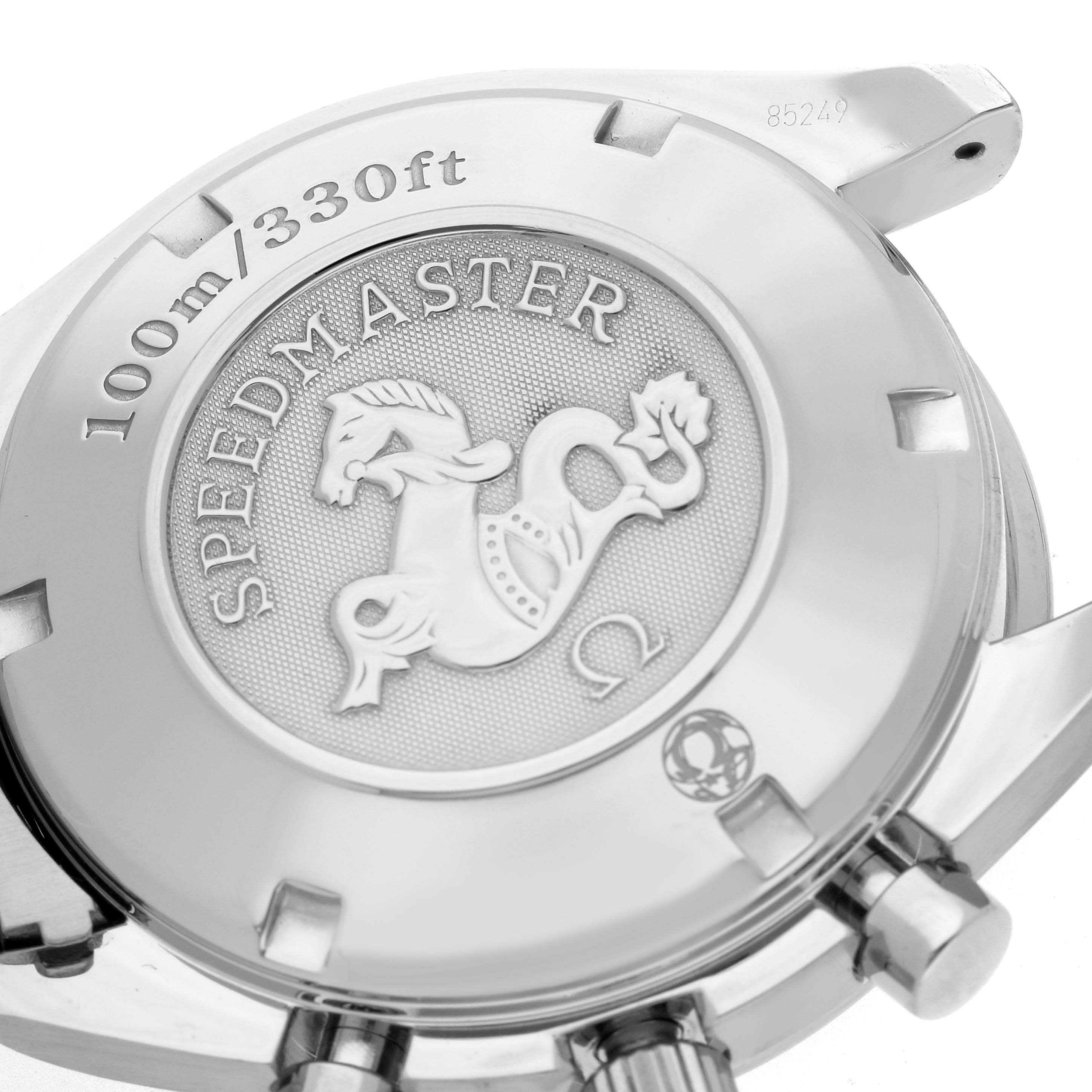 The image shows the case back of an Omega Speedmaster 323.10.40.40.02.001 Men
s Stainless Steel Silver Dial 323.10.40.40.02.001 Men
s Stainless Steel Silver Dial, highlighting its engraved emblem and depth rating.