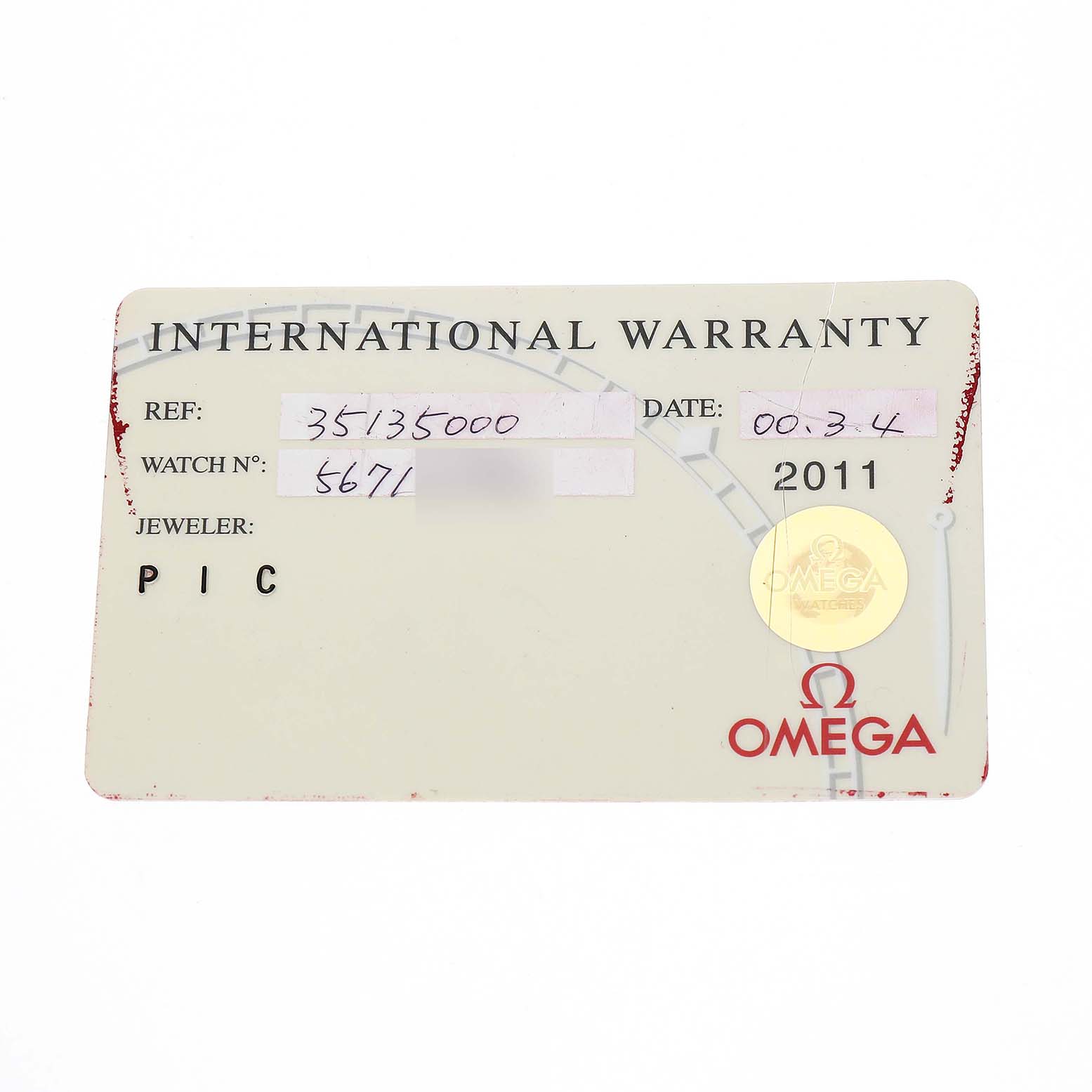 The image shows the International Warranty card for the Omega Speedmaster 3513.50.00 Men's Stainless Steel Black Dial watch, showing reference numbers and brand logo.