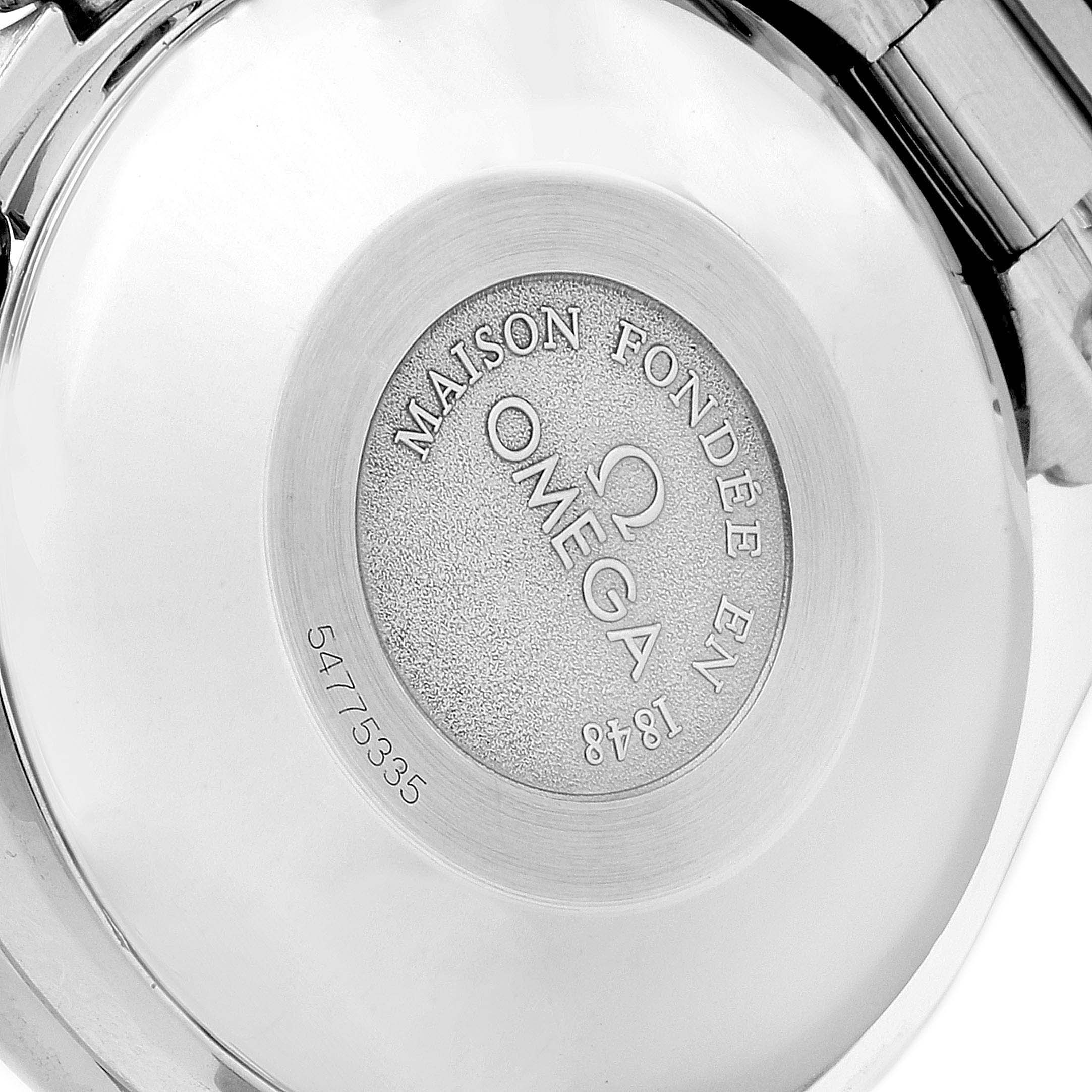 This image shows the case back of an Omega Speedmaster 3521.30.00 Men
s Stainless Steel Silver Dial 3521.30.00 Men
s Stainless Steel Silver Dial watch, featuring the Omega logo and serial number.
