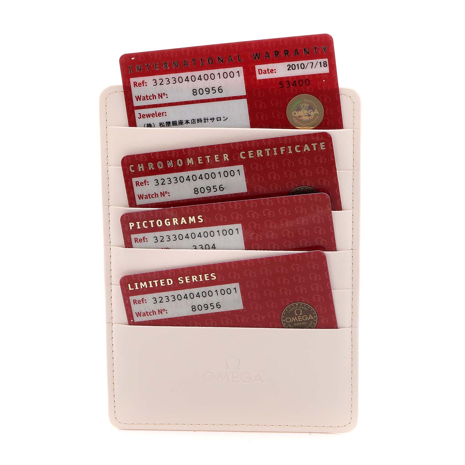 The image shows four certification cards for an Omega Speedmaster 323.30.40.40.01.001 Men
s Stainless Steel Black Dial 323.30.40.40.01.001 Men
s Stainless Steel Black Dial, including an international warranty and chronometer certificate.