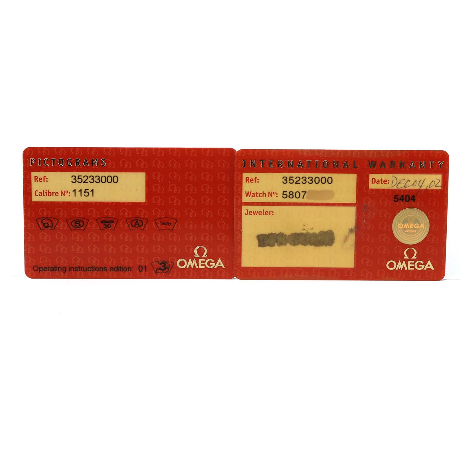 The image shows the warranty and pictogram cards for the Omega Speedmaster 3523.30.00 Men's Stainless Steel Silver Dial.