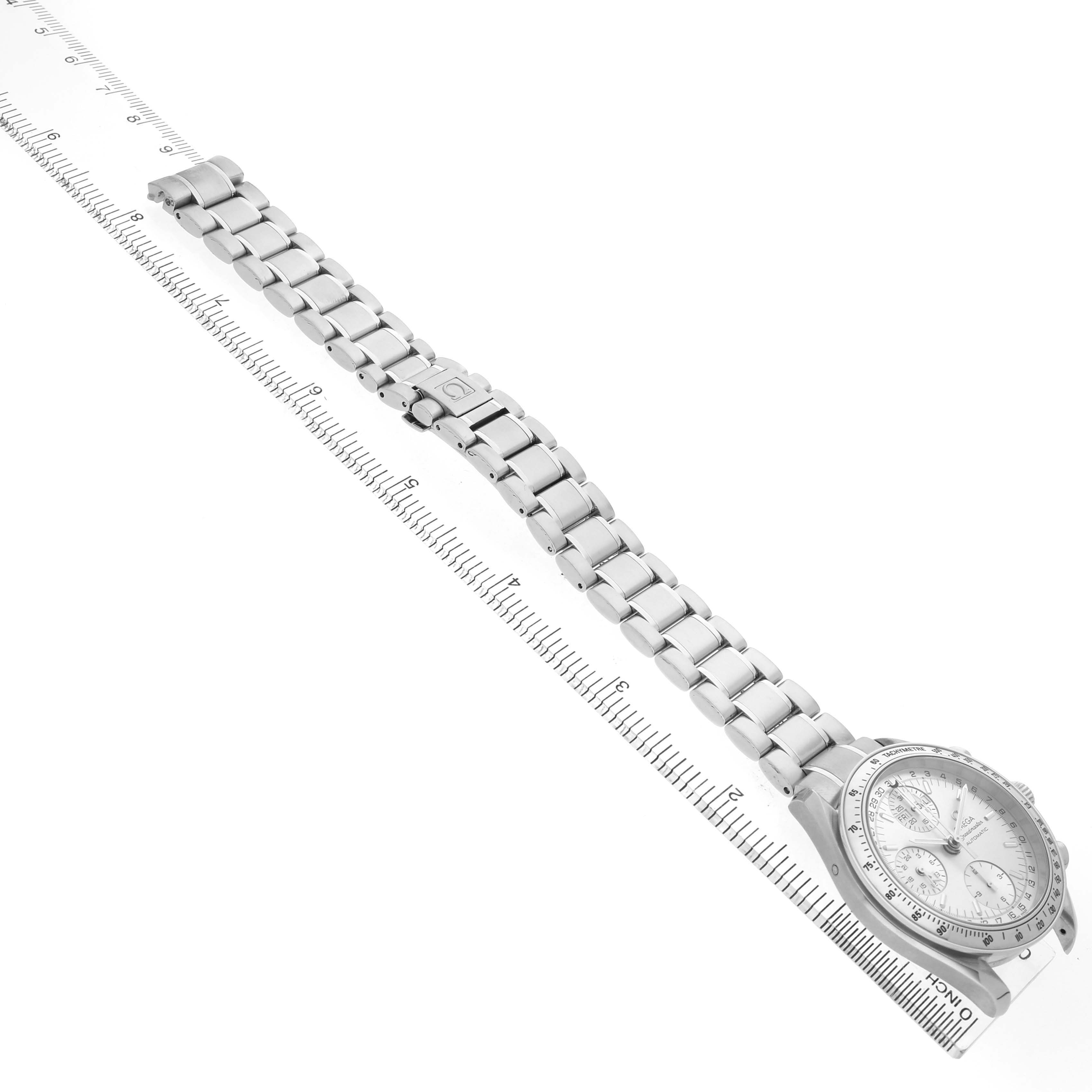 The Omega Speedmaster 3523.30.00 Men's Stainless Steel Silver Dial watch is shown from a side angle, displaying its bracelet, clasp, and face with a ruler for scale.