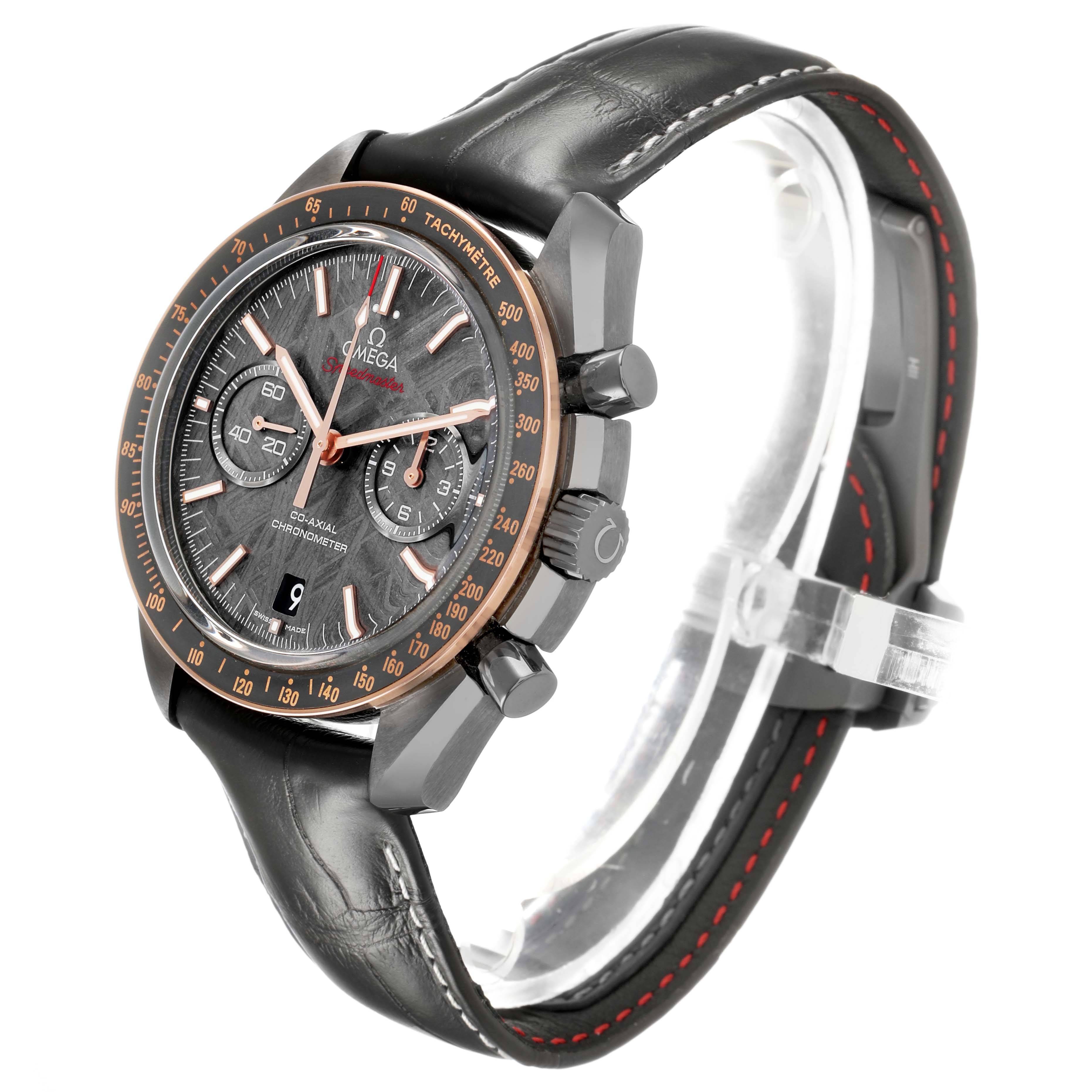 The Omega Speedmaster 311.63.44.51.99.001 Men's Ceramic Grey Dial watch is shown at a three-quarter angle, highlighting the dial, bezel, chronograph buttons, and leather strap.