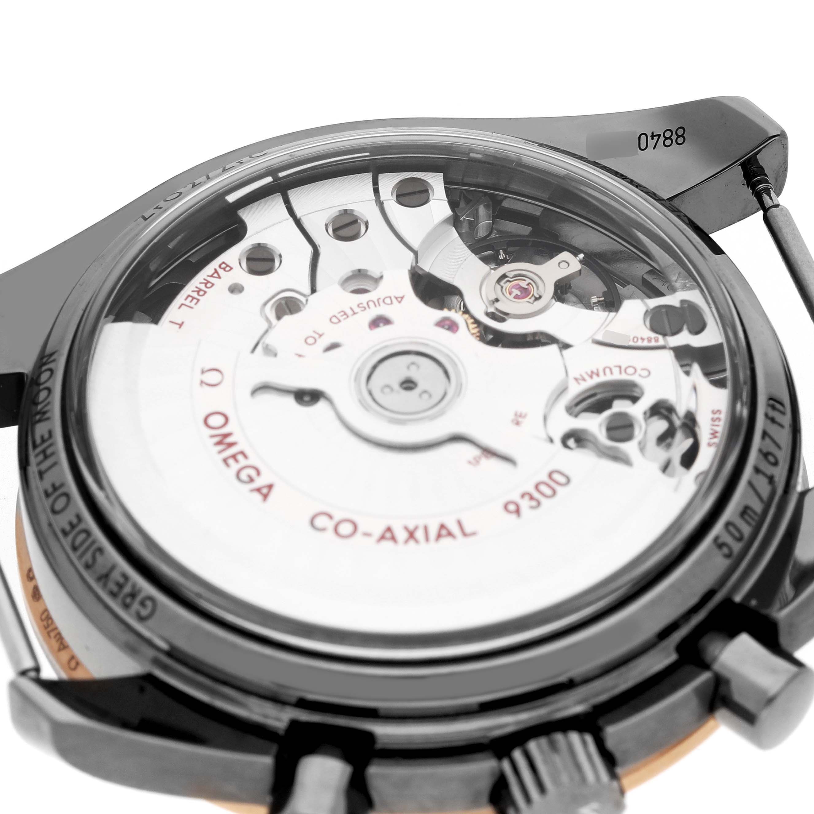 The image shows the case back of the Omega Speedmaster 311.63.44.51.99.001 Men's Ceramic Grey Dial, highlighting its Co-Axial 9300 movement.