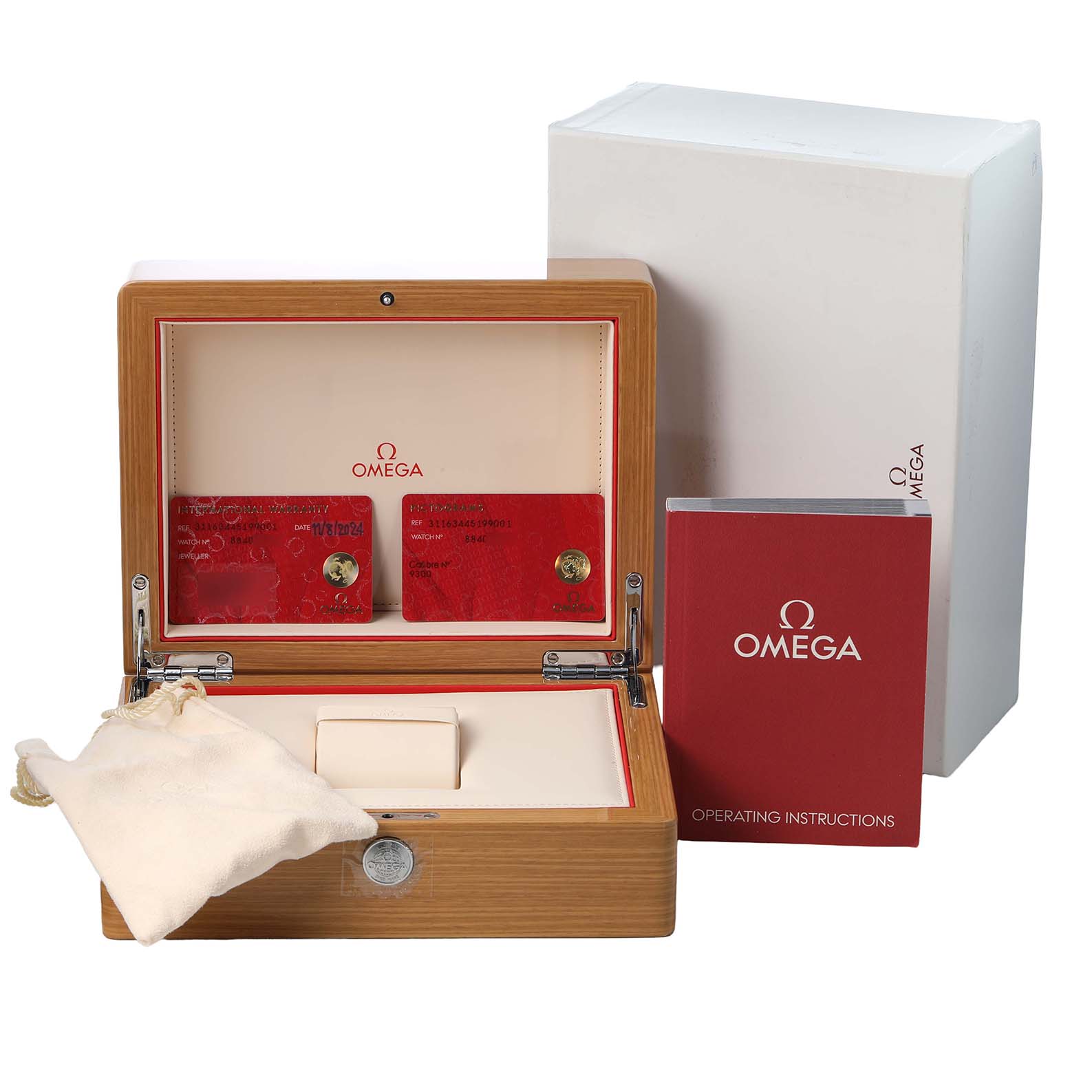 The image shows an Omega Speedmaster 311.63.44.51.99.001 Men's Ceramic Grey Dial box with cards, a manual, and a protective pouch.