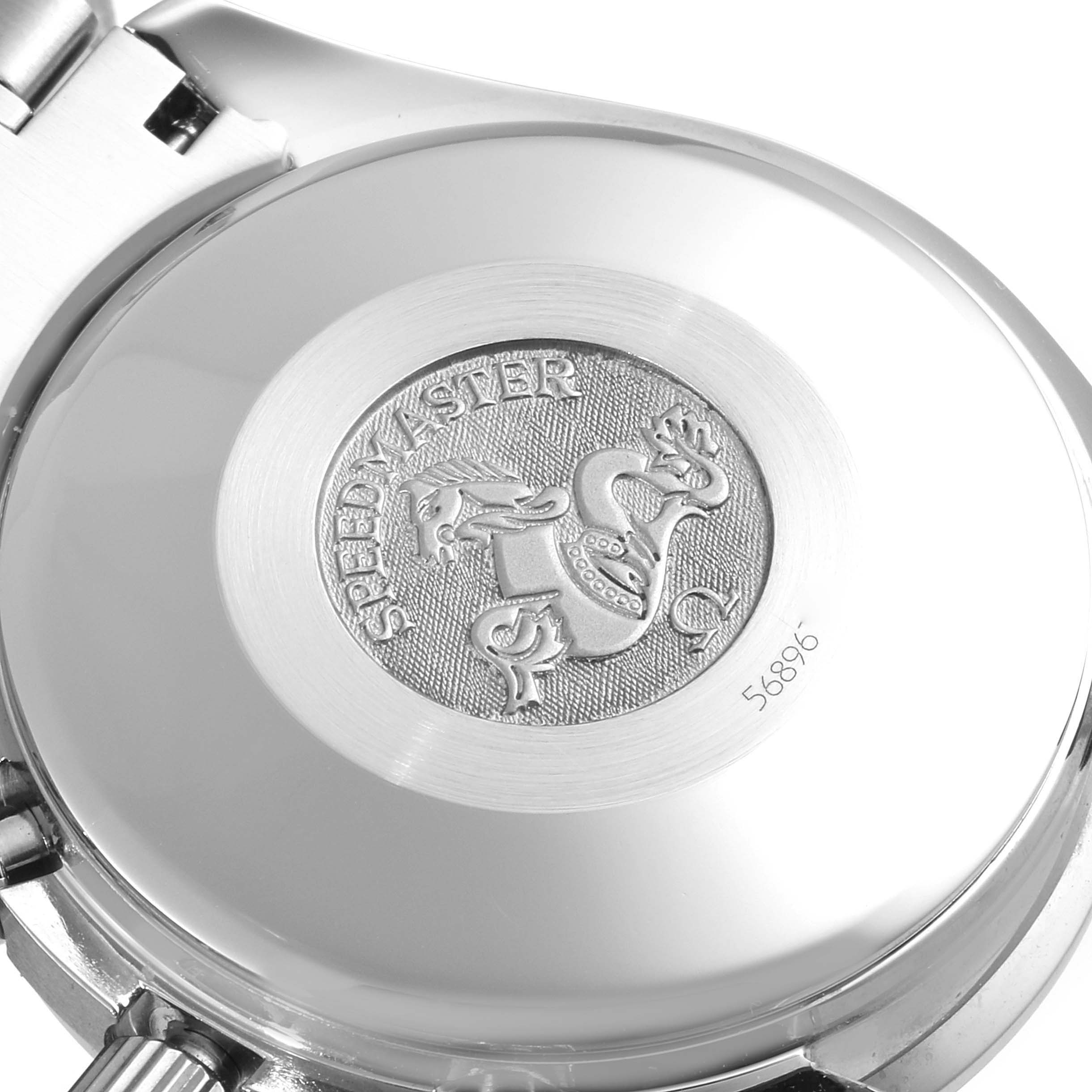 The image shows the back case of an Omega Speedmaster 3520.53.00 Men
s Stainless Steel Grey Dial 3520.53.00 Men
s Stainless Steel Grey Dial watch, featuring an engraved emblem and serial number.