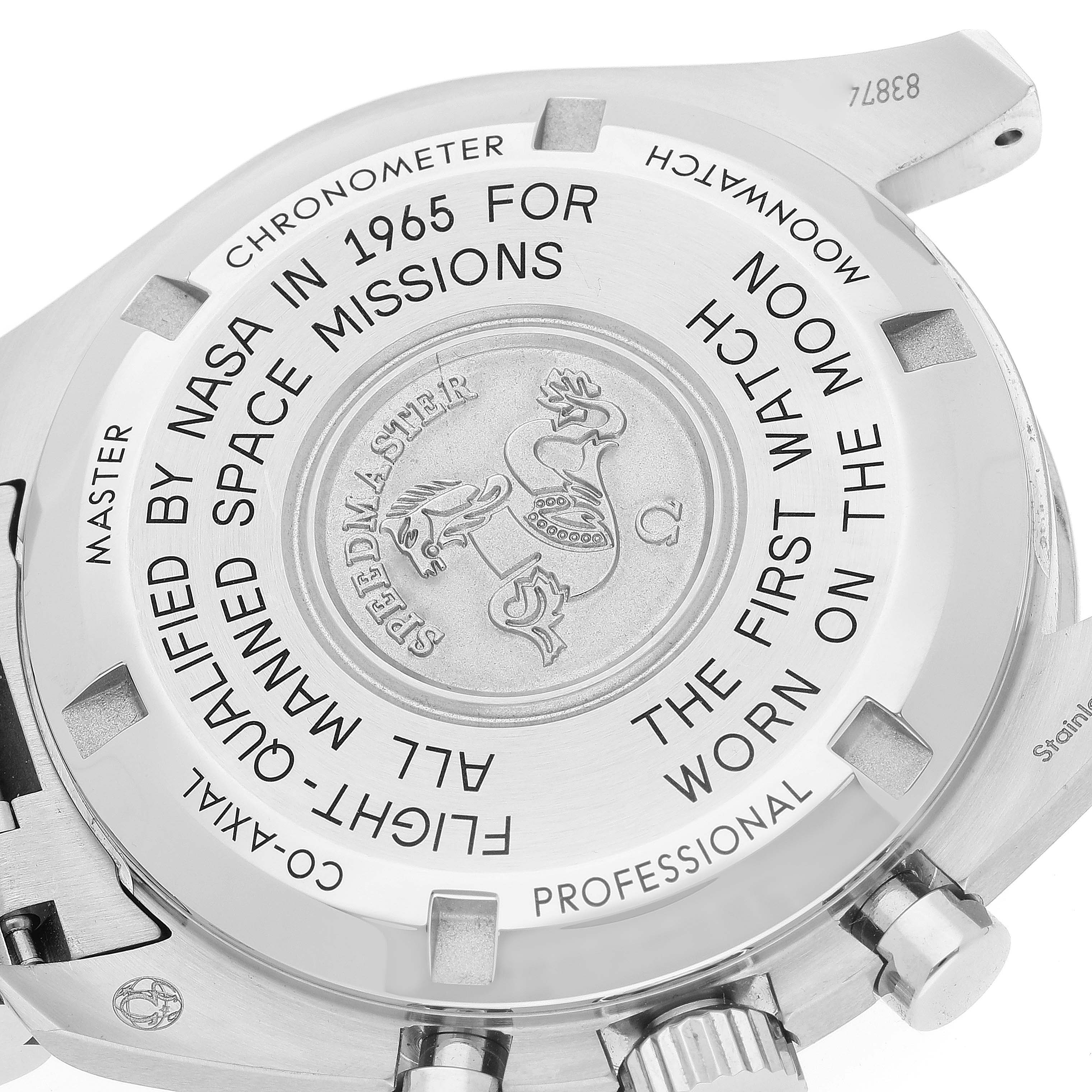 The image shows the engraved case back and part of the crown and buttons of an Omega Speedmaster 310.30.42.50.01.001 Men's Stainless Steel Black Dial 310.30.42.50.01.001 Men's Stainless Steel Black Dial watch.