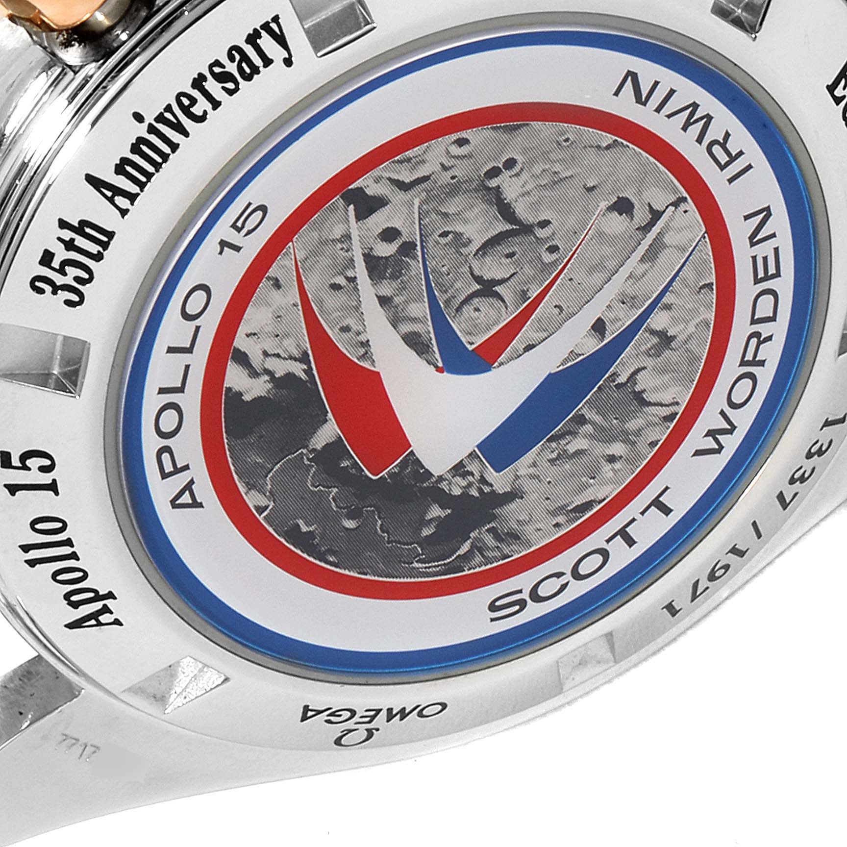 The image shows the case back of an Omega Speedmaster 3366.51.00 Men's Steel and Gold (two tone) Black Dial 3366.51.00 Men's Steel and Gold (two tone) Black Dial Apollo 15 35th Anniversary edition, highlighting the commemorative inscription.