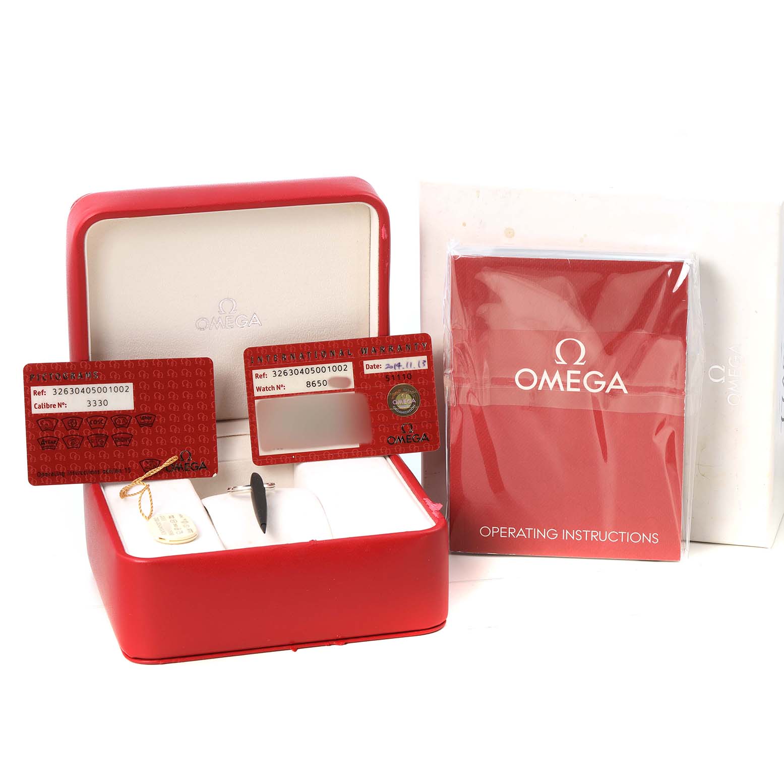 This image shows the Omega Speedmaster 326.30.40.50.01.002 Men's Stainless Steel Black Dial packaging, including a red box, warranty cards, and an instruction manual.