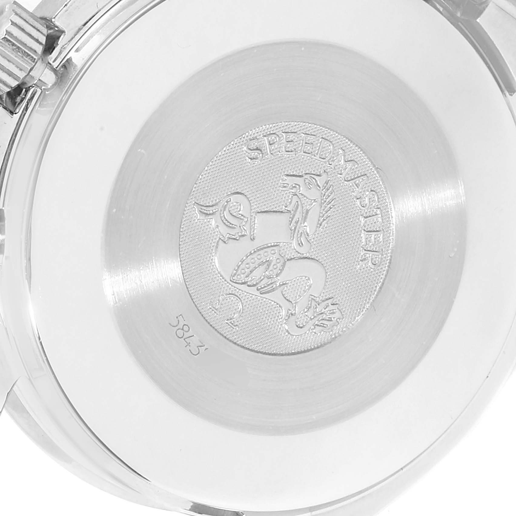 The image shows the case back of the Omega Speedmaster 3510.82.00 Men's Stainless Steel Blue Dial 3510.82.00 Men's Stainless Steel Blue Dial watch, displaying its logo and engravings.