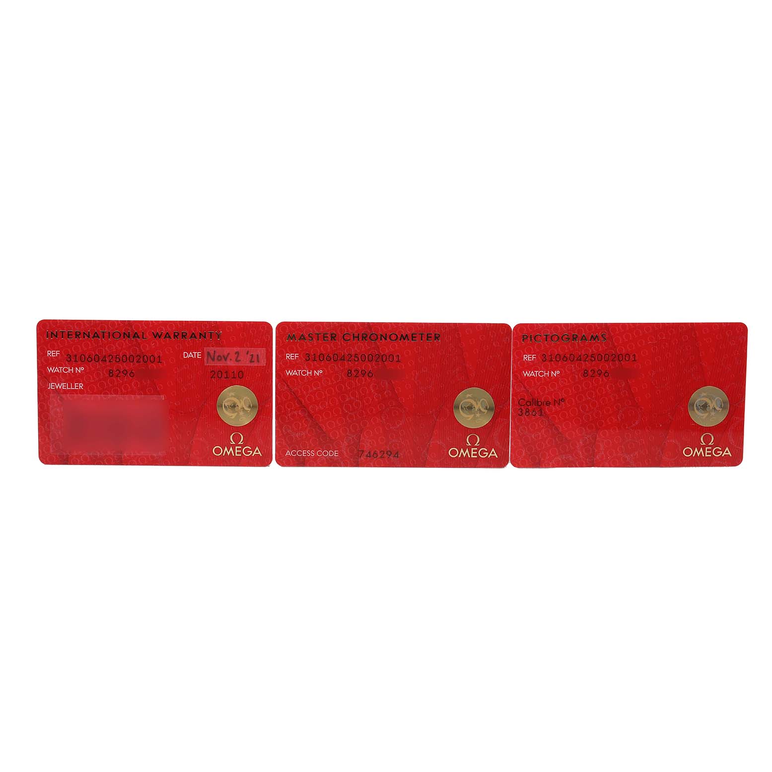 The image shows three red Omega Speedmaster 310.60.42.50.02.001 Men's White Gold Silver Dial warranty cards from a top-down angle, featuring text and logos.
