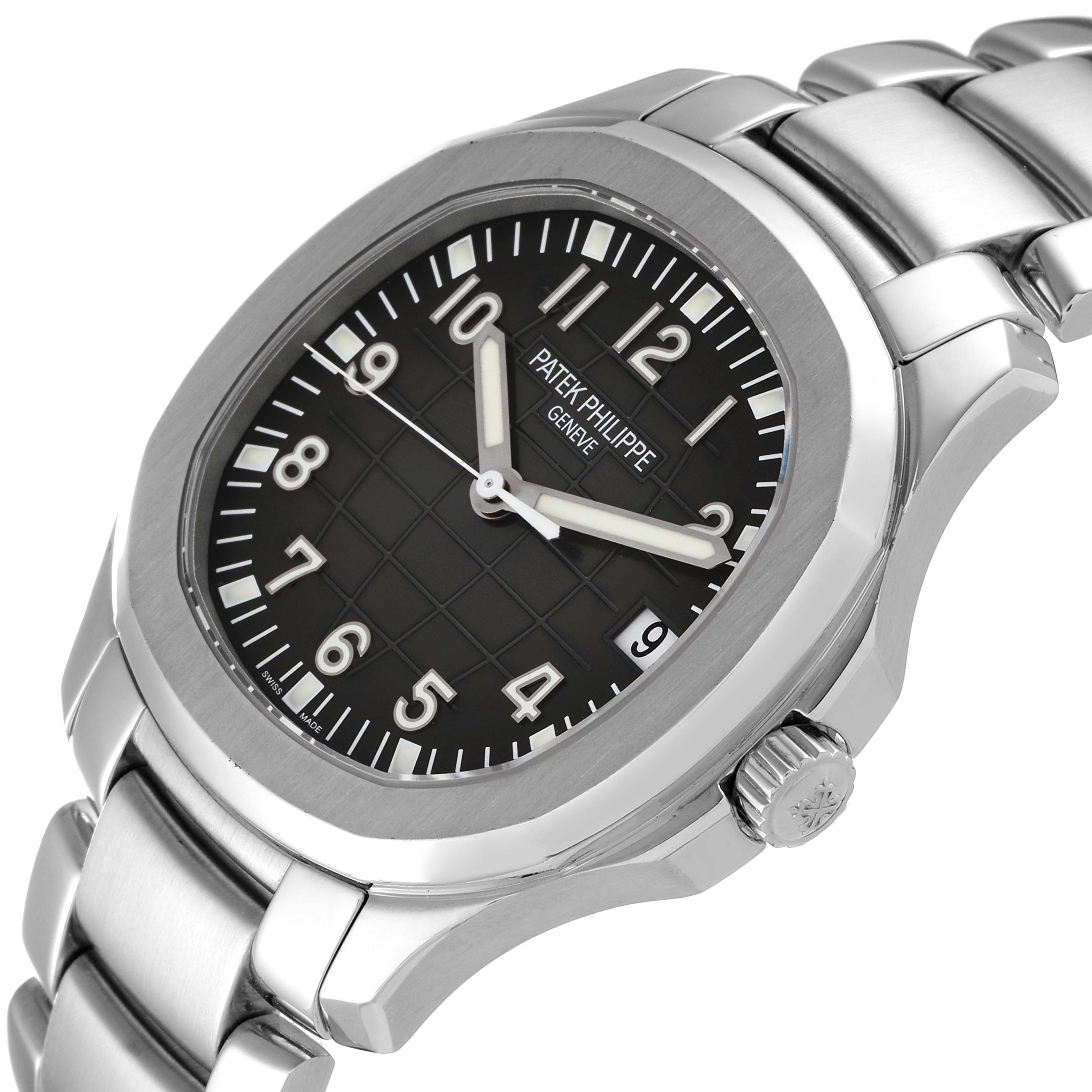 The image shows a Patek Philippe Aquanaut 5167/1A-001 Men's Stainless Steel Black Dial 5167/1A-001 Men's Stainless Steel Black Dial watch at an angled view, featuring its dial, hands, bezel, and part of its bracelet.