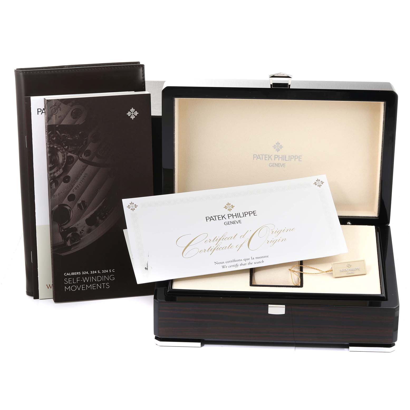 The image shows the packaging and accompanying documents for the Patek Philippe Aquanaut 5167A Men's Stainless Steel Black Dial 5167A Men's Stainless Steel Black Dial watch, including the box, manuals, and certificate of origin.