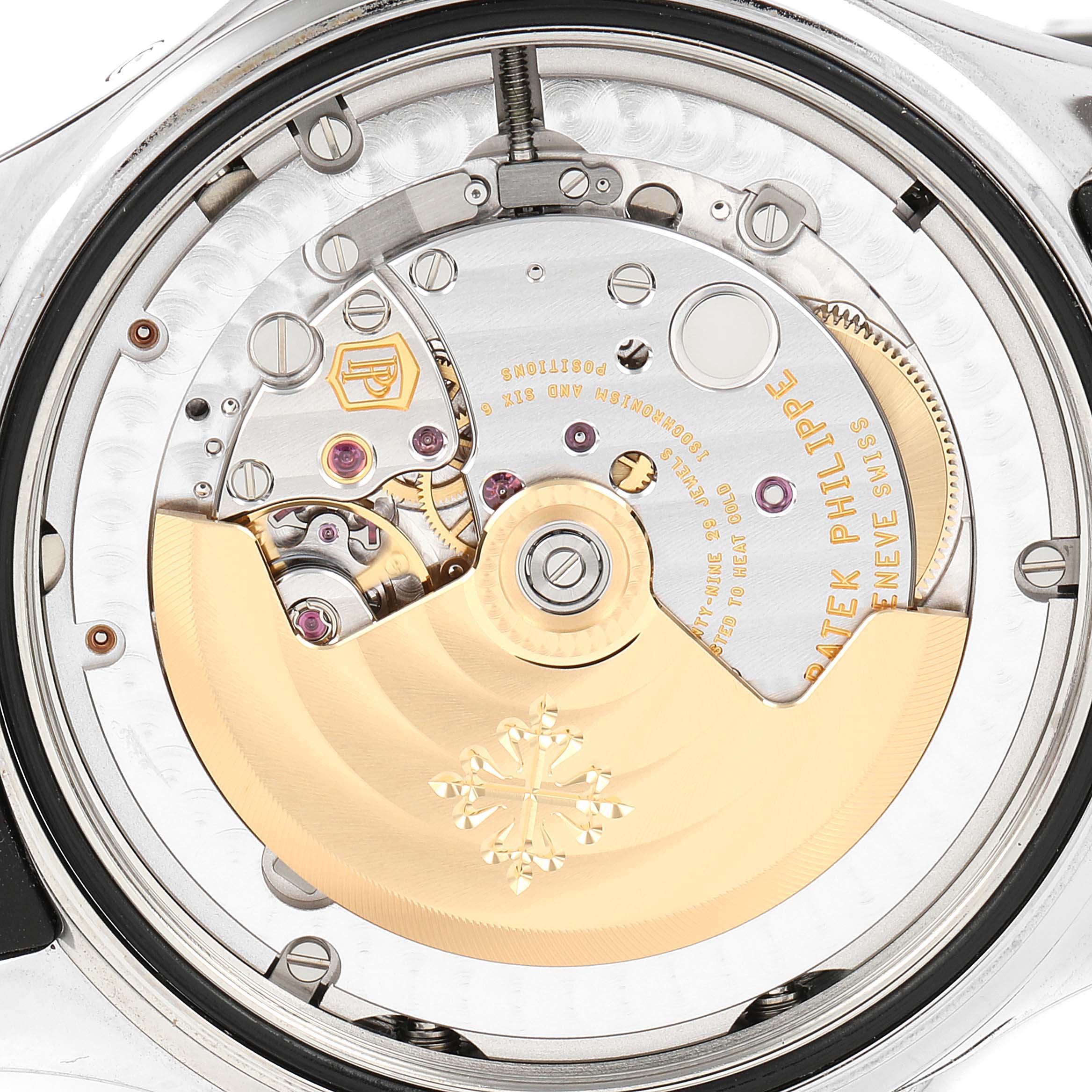 This image shows the back side of the Patek Philippe Aquanaut 5164A Men's Stainless Steel Black Dial 5164A Men's Stainless Steel Black Dial watch, highlighting its intricate internal movement parts.