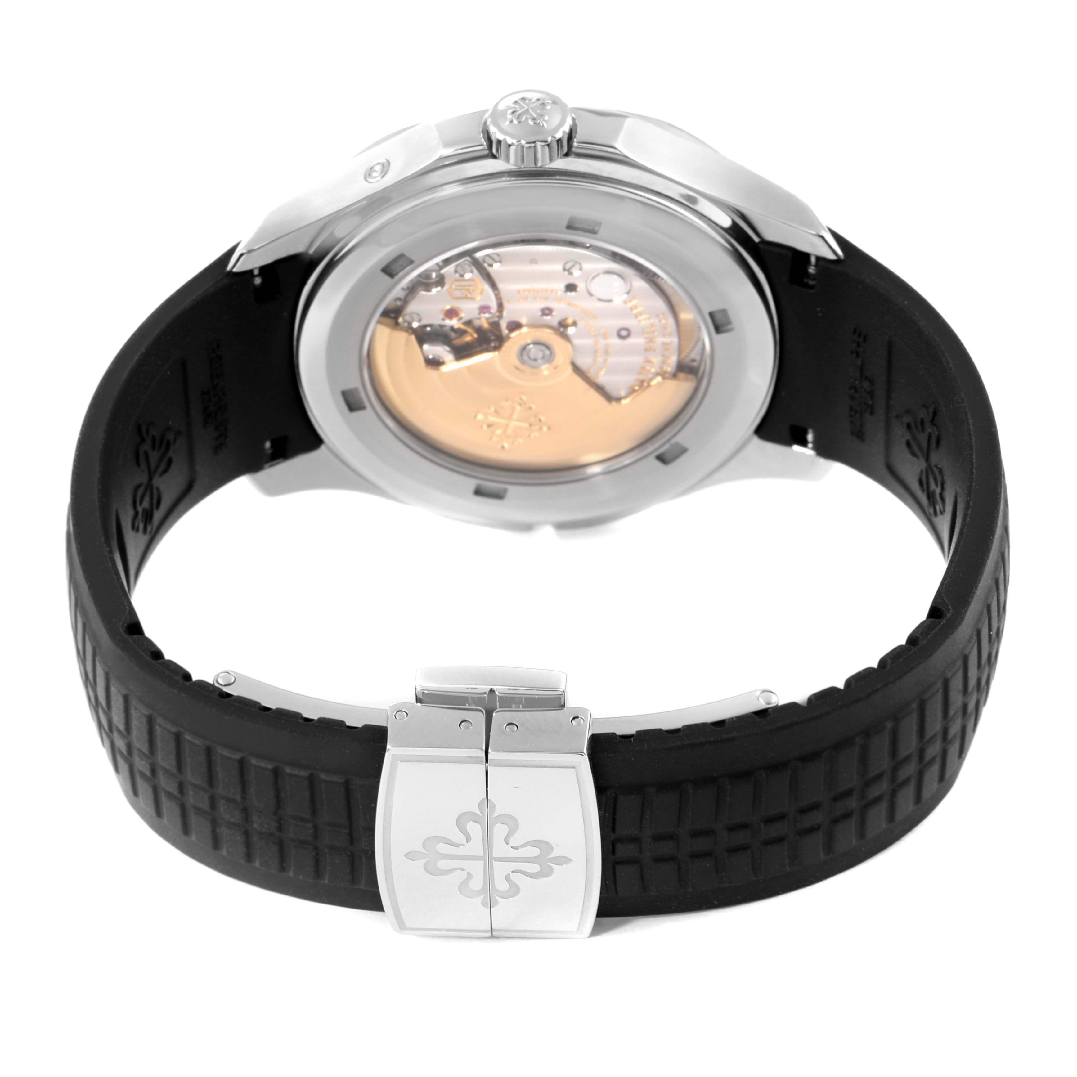 The image shows the back view of a Patek Philippe Aquanaut 5164A Men's Stainless Steel Black Dial 5164A Men's Stainless Steel Black Dial watch, displaying its open caseback and clasp on the rubber strap.
