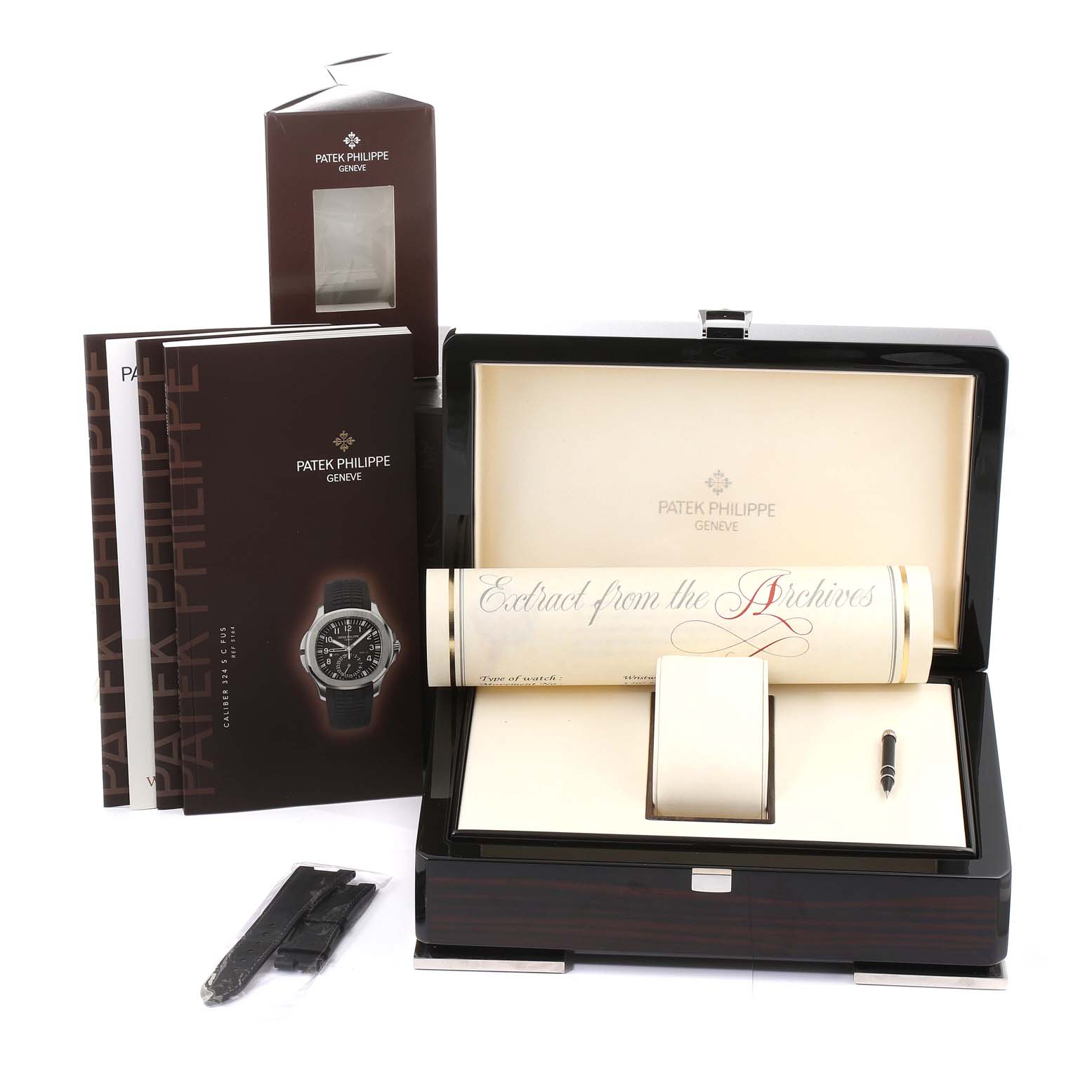 The image shows an open presentation box for the Patek Philippe Aquanaut 5164A Men's Stainless Steel Black Dial 5164A Men's Stainless Steel Black Dial, along with documents, an extra strap, and a pen.