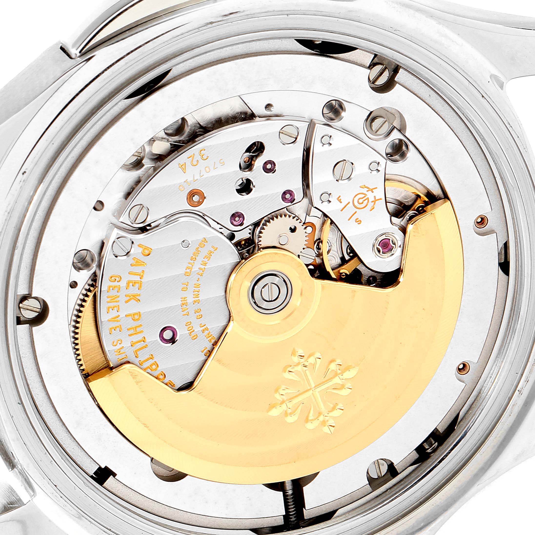 The image shows the back view of a Patek Philippe Aquanaut 5164A Men's Stainless Steel Black Dial 5164A Men's Stainless Steel Black Dial watch, highlighting its intricate movement and rotor.