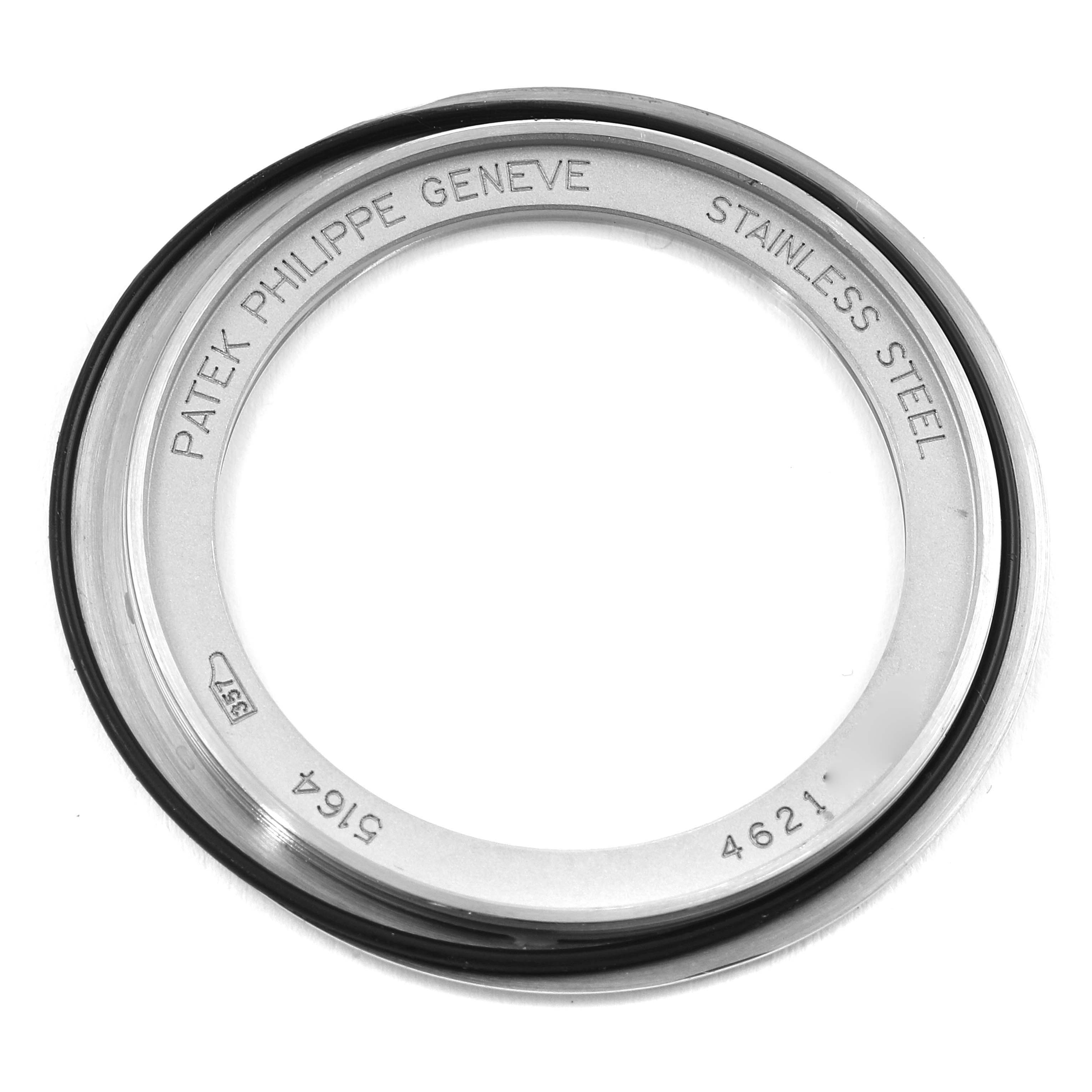 This image shows the stainless steel case back part of a Patek Philippe Aquanaut 5164A Men's Stainless Steel Black Dial 5164A Men's Stainless Steel Black Dial watch from a top-down angle.