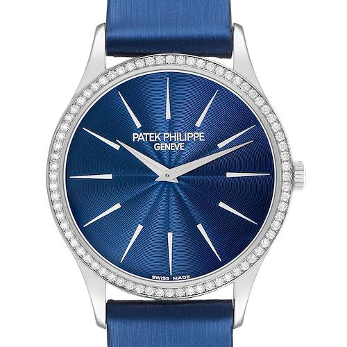 The Patek Philippe Calatrava 4896G Women's White Gold Blue Dial watch is shown from the front, featuring a blue dial, diamond bezel, and blue strap.
