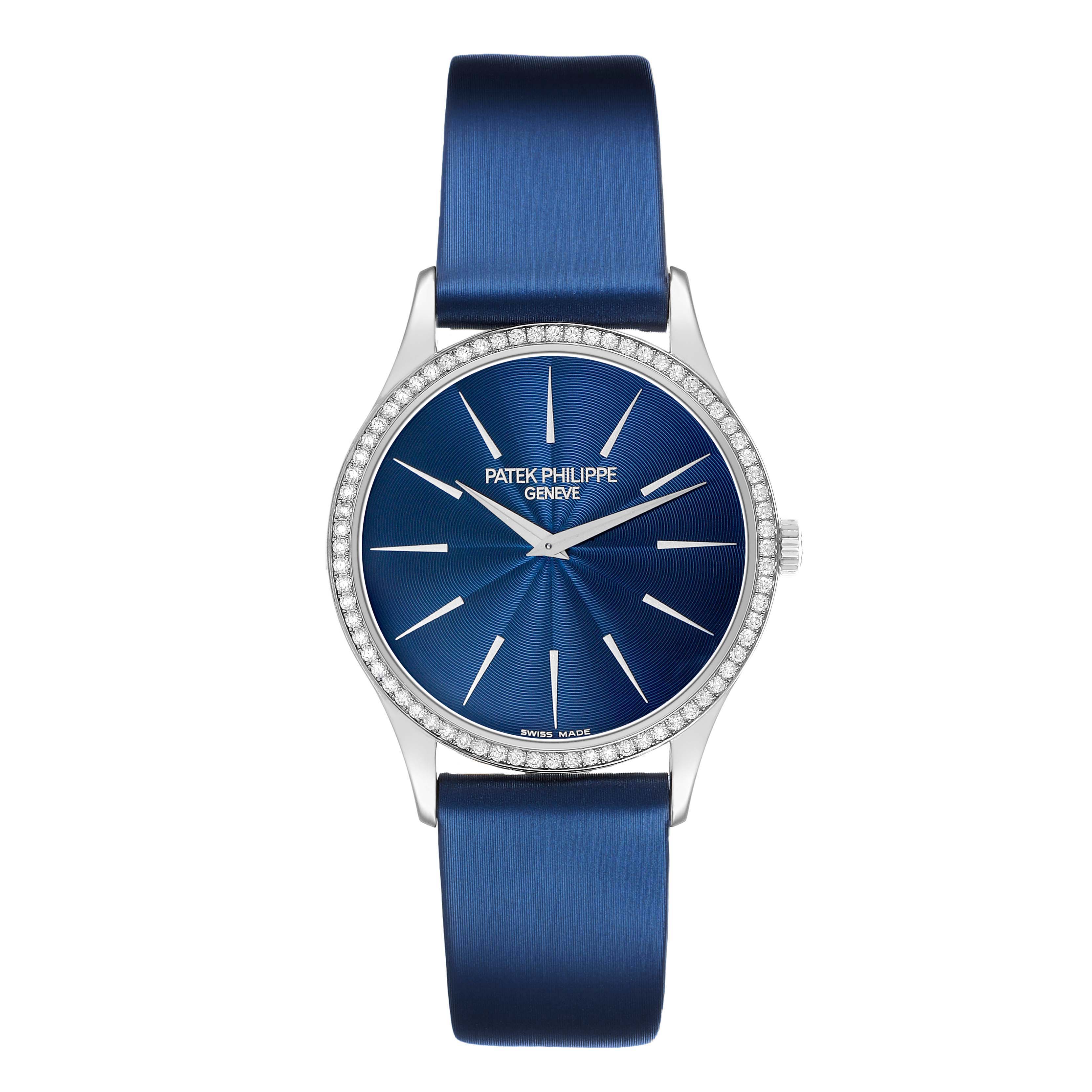 The Patek Philippe Calatrava 4896G Women's White Gold Blue Dial is shown from a top-down angle, highlighting its blue dial, slim hands, and diamond-set bezel.